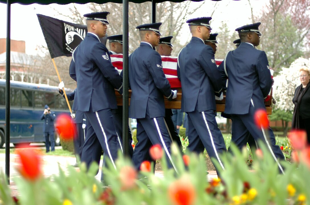 Members of the Air Force Honor Guard carry the remains of Maj. Perry H. Jefferson into the Old Chapel April 3 at Fort Myer, Va. Major Jefferson had been listed as missing in action for 39 years in action in Vietnam. Major Jefferson was an intelligence officer with the Colorado Air National Guard's 120th Tactical Fighter Squadron and on April 3, 1969, he was flying aboard an O-1 Bird Dog observation aircraft that never returned to their base. (U.S. Air Force photo/Tech. Sgt. Mike R. Smith) 
