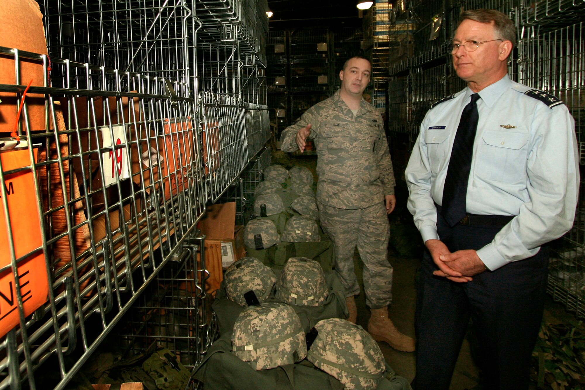 GRISSOM AIR RESERVE BASE, Ind., -- Lt. Gen. John Bradley, commander of the Air Force Reserve Command, is shown the mobility assets of the 434th Security Forces Squadron by Master Sgt. Michael Kamp, NCOIC of the 434th SFS supply and mobility section. General Bradley toured a number of work areas during his visit to Grissom ARB.  (U.S. Air Force photo/Tech. Sgt. Patrick Kuminecz)