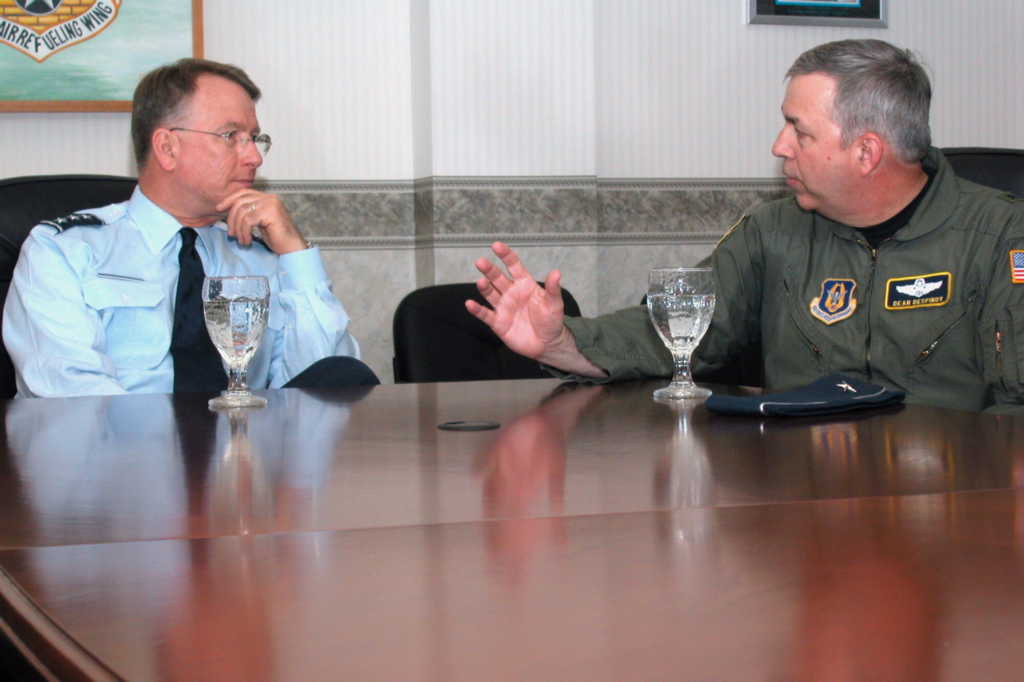 GRISSOM AIR RESERVE BASE, Ind., -- Lt. Gen. John Bradley, left, commander of the Air Force Reserve Command is briefed by Brig. Gen. Dean Despinoy, 434th Air Refueling Wing commander, on Grissom's "Seasoning" program.  This innovative program takes new Air Force Reserve enlistees after completion of their respective technical school and provides extended training in their career field at Grissom. (Air Force photo/Senior Airman Chris Bolen)     