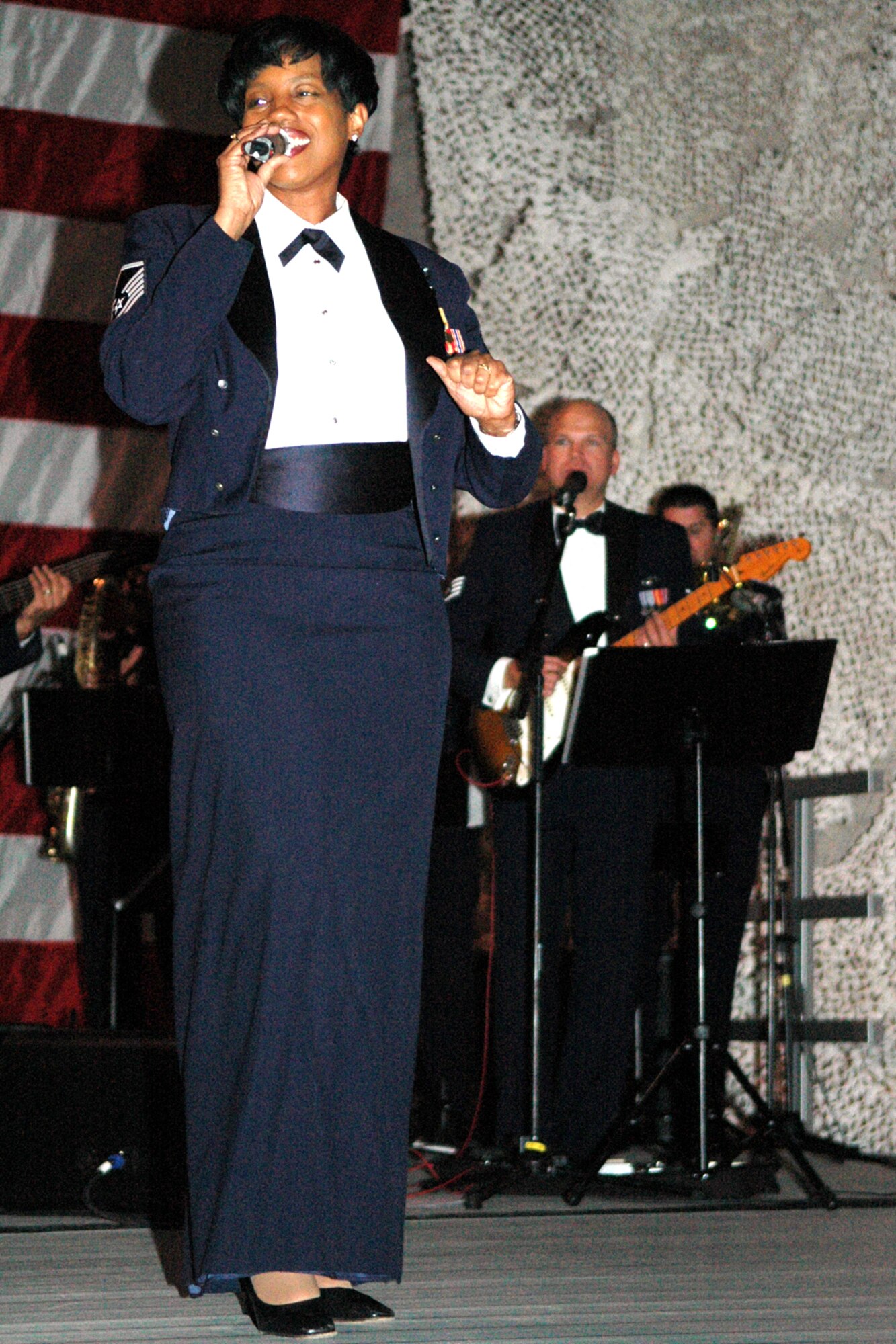 GRISSOM AIR RESERVE BASE, Ind., -- A vocalist with the Air Force Reserve Command band performs during Grissom's recent Military Ball. The event, held in recognition of the Air Force Reserve Command's 60th anniversary, featured Lt. Gen. John Bradley, Commander of the Air Force Reserve Command, as the guest speaker. (U.S. Air Force photo/Senior Airman Ben Mota)