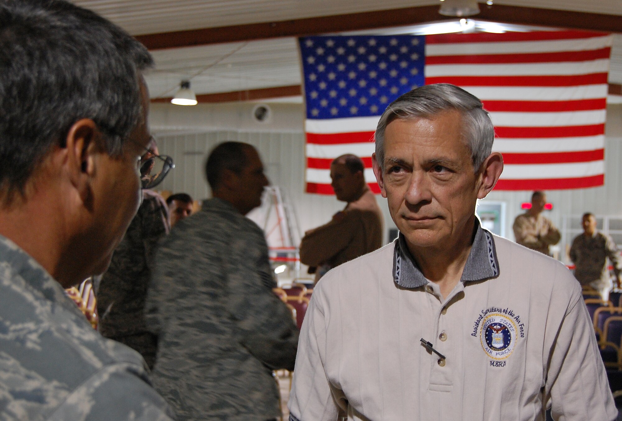 SOUTHWEST ASIA -- The Honorable Craig Duehring, the Assistant Secretary of the Air Force for Manpower and Reserve Affairs, Washington, D.C., listens to Master Sgt. Al Fidance, 386th Expeditionary Civil Engineer Squadron structures, about concerns he has following an open forum at an air base in the Persian Gulf Region recently. Sergeant Fidance is deployed from the 166th CES, 166th Ailift Wing, Deleware Air National Guard. Mr. Duehring, Brig. Gen. William Busby, and Col. Anne Hamilton, are visiting bases throughout the deployed theater to gain insight on manpower, morale, and Reserve affairs issues affecting today’s Airmen and much more. (Air Force photo/Tech. Sgt. Michael O'Connor)
