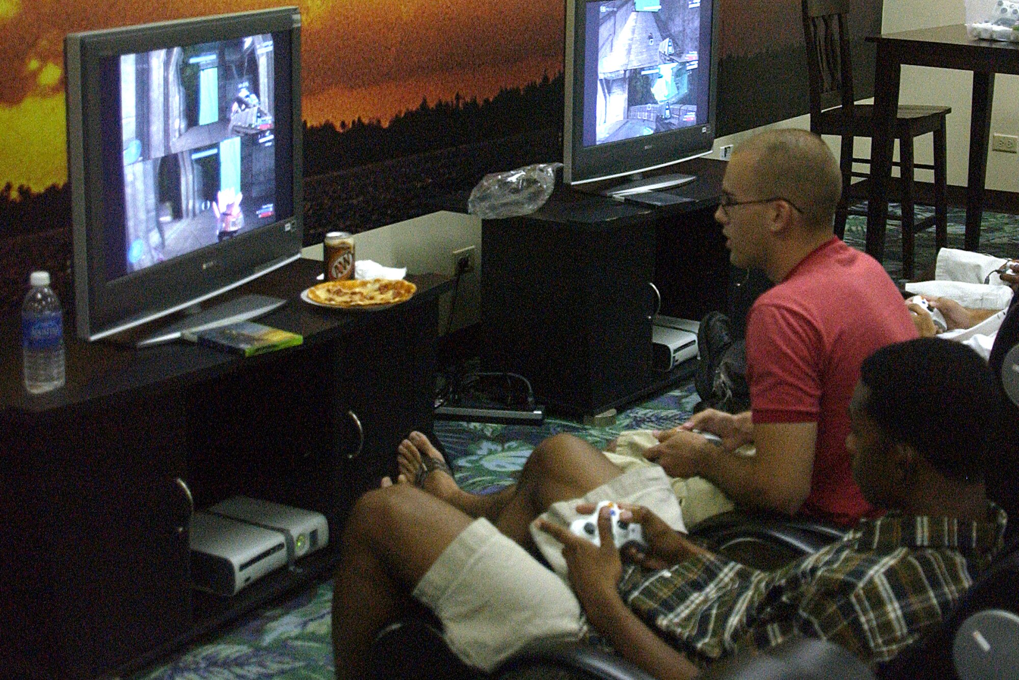 Staff Sergeant Jordan Simon, 36th Munitions Squadron and Technical Sergeant Anthony Augustine, 644th Combat Communications Squadron, battled against other teams during the Halo 3 Tournament during the First Sergeants' Hot Spot Tournament. (U.S. Air Force photo by Airman 1st Class Carissa Wolff)