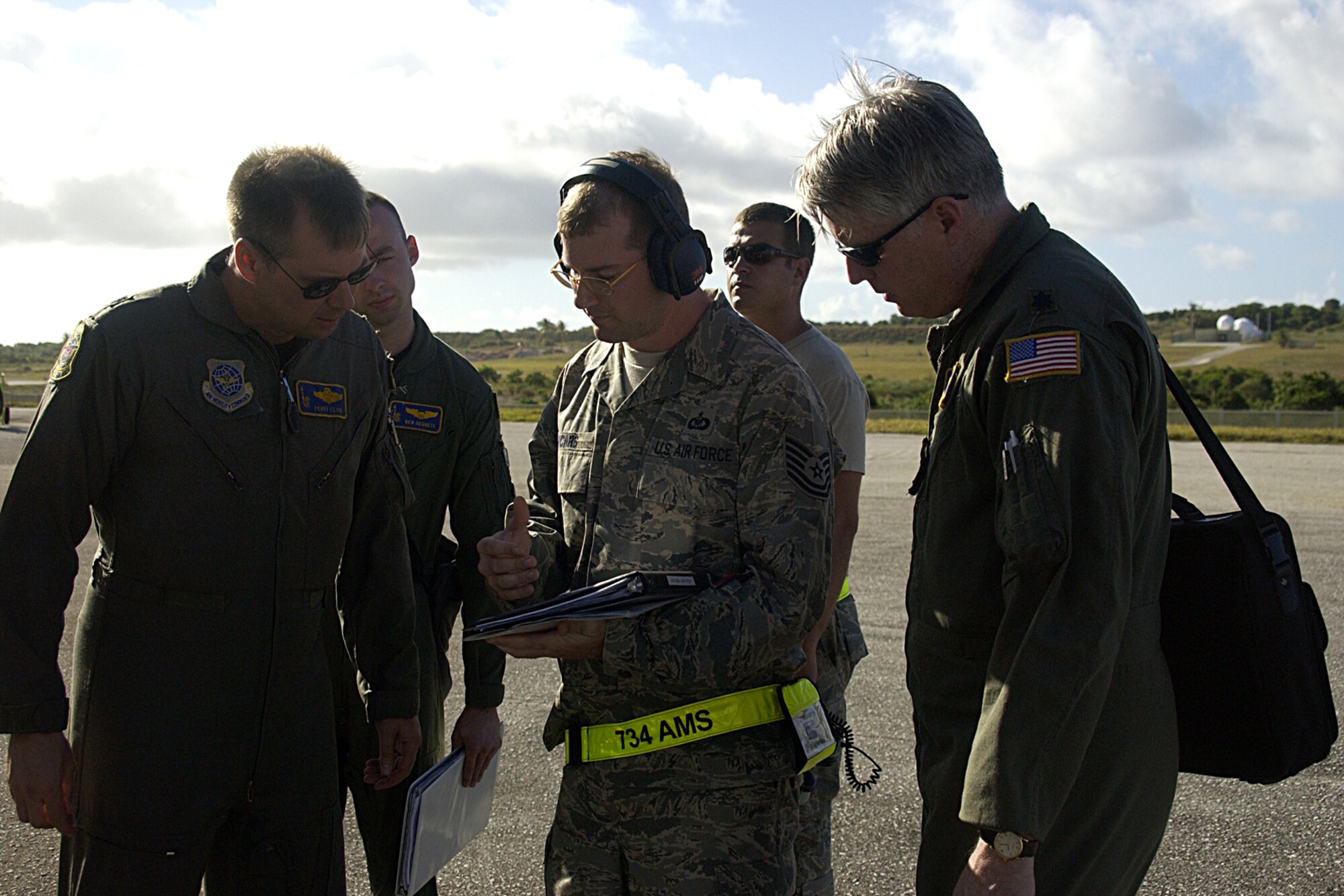 Technical Sergeant Brian Vicars, 734th Air Mobility Squadron, participates in the  Prime Knight program here at Andersen, which briefs an incoming aircrew on its amenities while on Guam. The controller along with the Aircraft Commander sets up times for the dining facility and crew bus times. The PK program essentially expedites mission movement by enabling the aircrew to enter crew rest upon arrival. Sgt. Vicars shop, the Air Mobility Command Center won the Air Mobility Command Center of the Year. (U.S. Air Forcce photo by Airman 1st Class Carissa Wolff)
