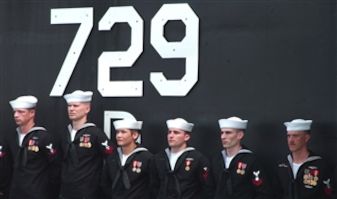 Crewmembers of the guided missile submarine USS Georgia (SSGN 729) stand at parade rest during a return to service ceremony for the boat in Kings Bay, Ga., on March 28, 2008.  The submarine is being returned to service after being converted to conventional land attack and Special Operations Forces platform.  