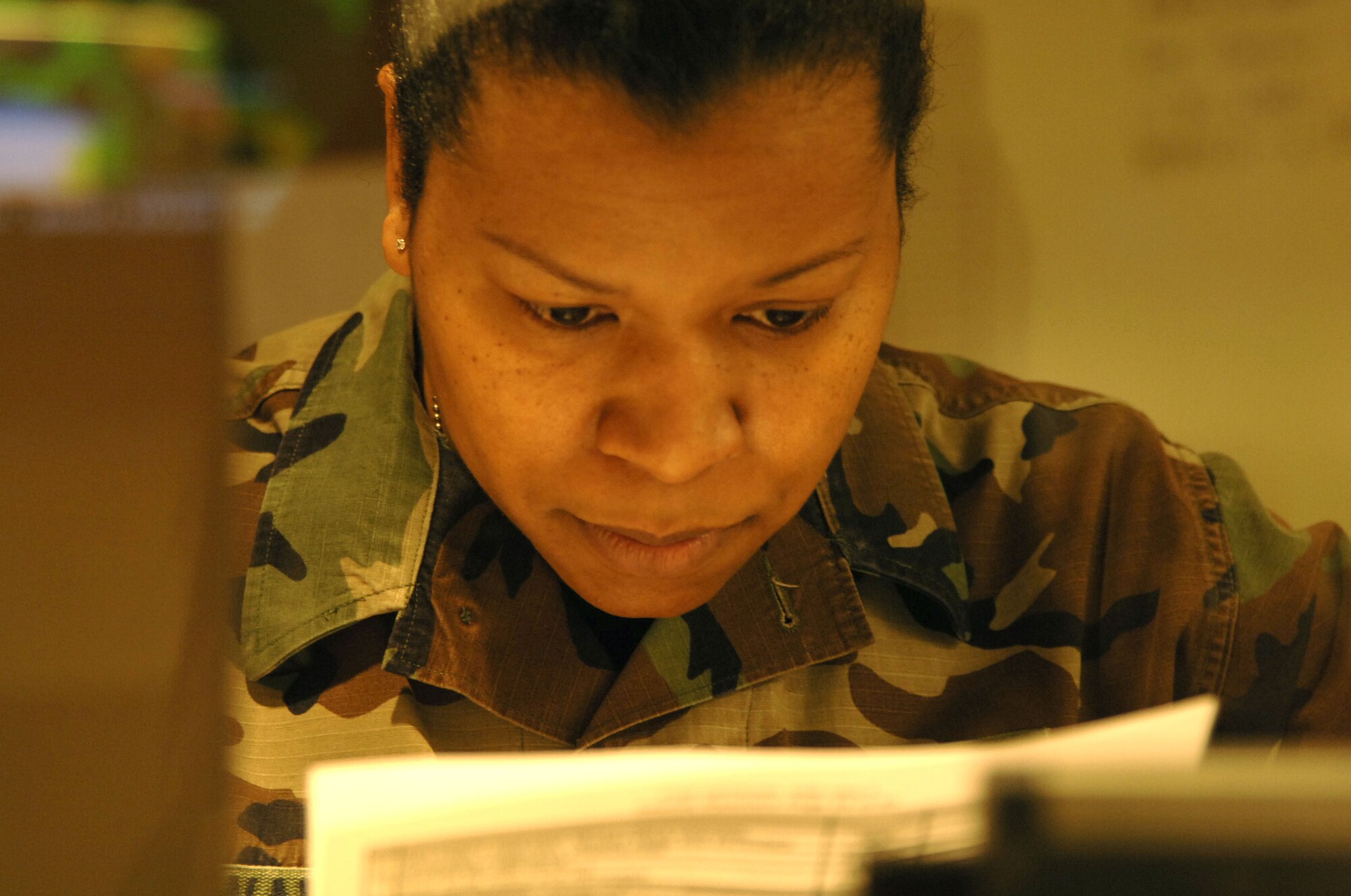 VOLK FIELD AIR NATIONAL GUARD BASE, Wis. -- Master Sgt. Rachel Swann, from McConnell Air Force Base, Kan., reviews the procedures of Force Protection Alpha on Apr. 1, during an exercise at Volk Field. This exercise is a four-day event to demonstrate Airmen capabilities to do their jobs while surviving in a chemical environment. The exercise is in preparation for the upcoming Air Mobility Command Operational Readiness Inspection in June, which will combine Air Force Active Duty, Reserve and Guard to demonstrate a total force team. (Photo by Tech. Sgt. Chyrece Campbell)
