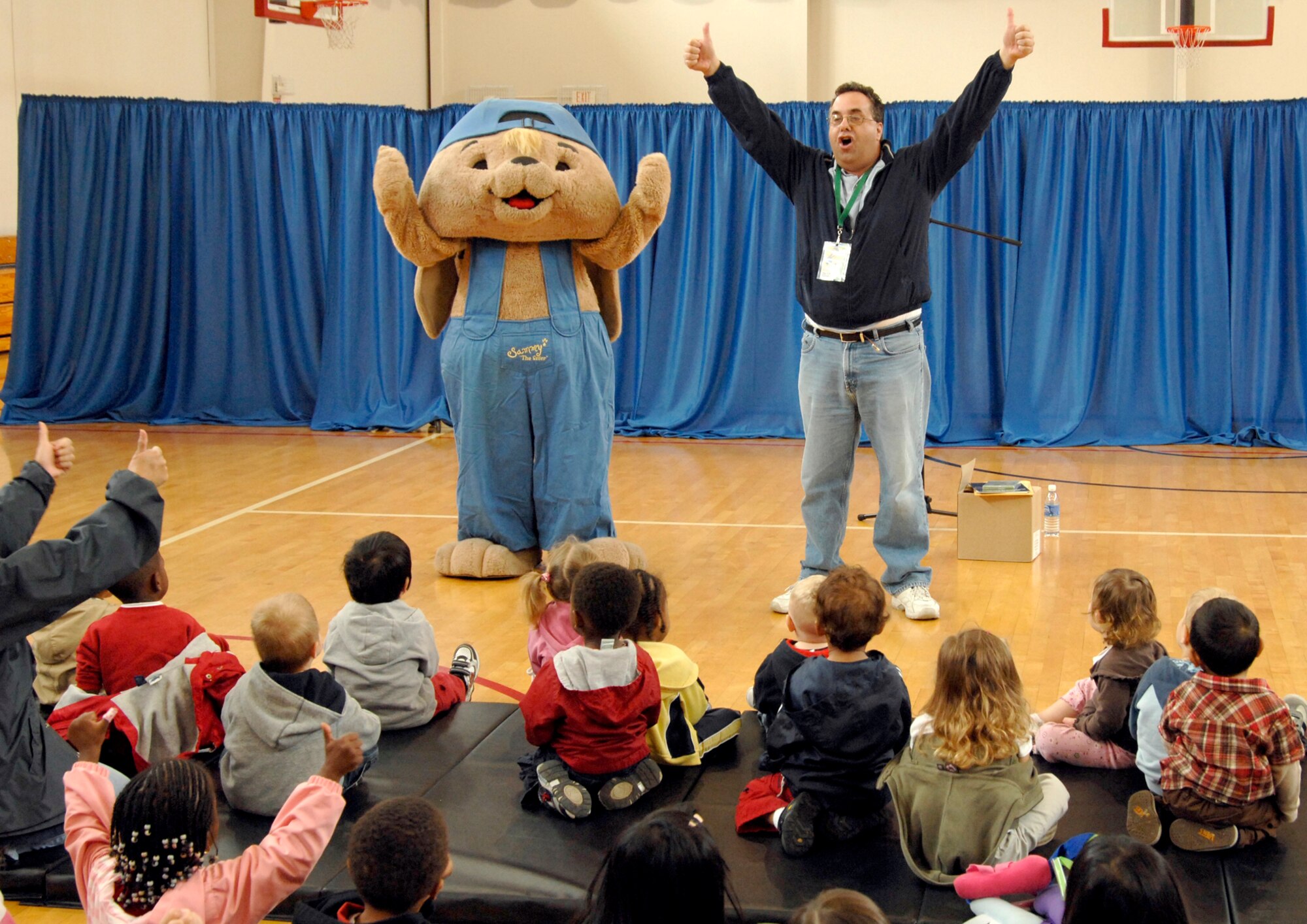 Sammy “The Saver” Rabbit and children’s author Sam X. Renick visited Los Angeles AFB to teach children about the importance of both saving money and reading, April 1. The event was sponsored by the Air Force Aid Society and Aerospace Federal Credit Union. Each child who attended received a complimentary music CD and “It’s a Habit, Sammy Rabbit!” story book. (Photo by Lou Hernandez)