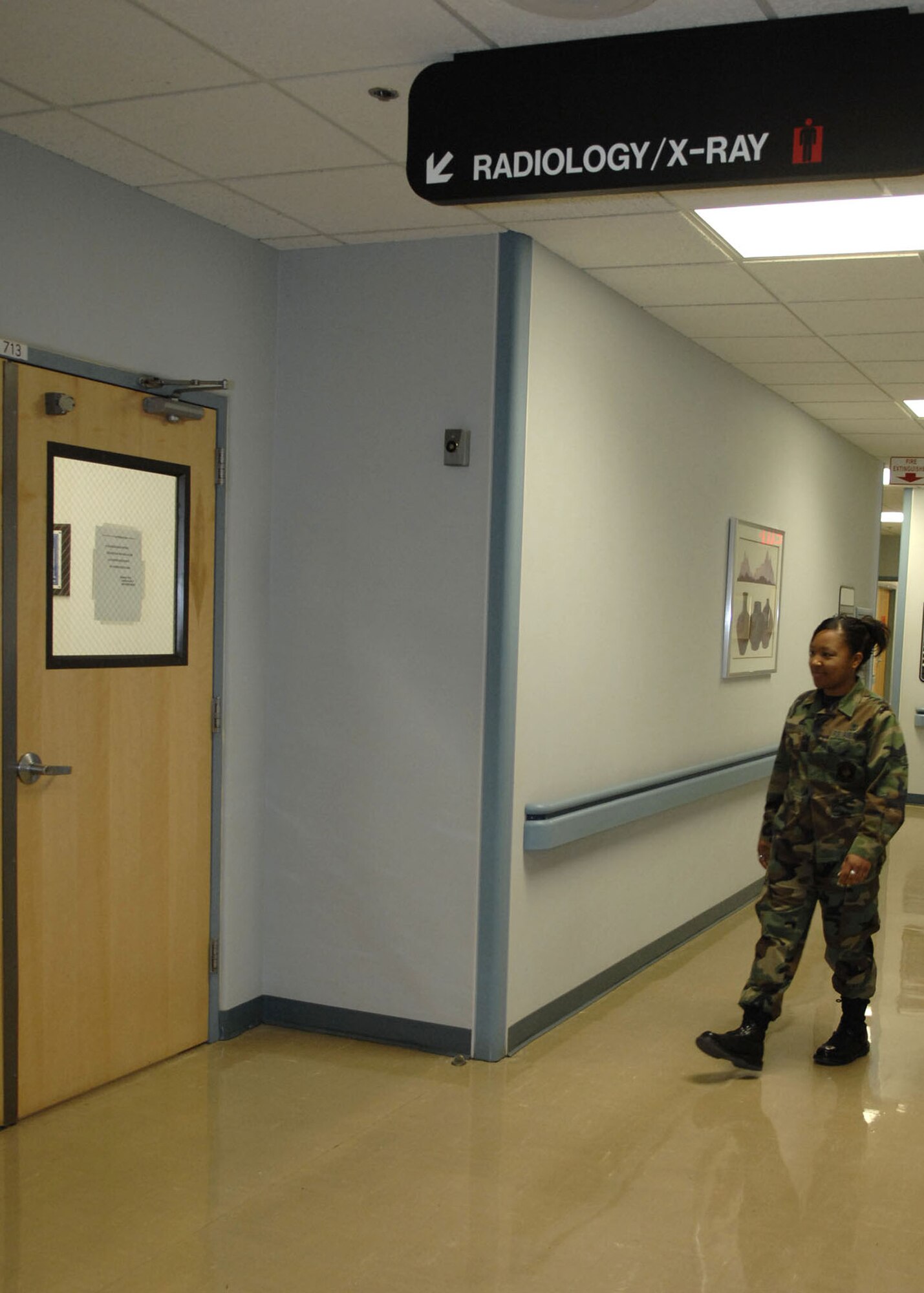 HOLLOMAN AIR FORCE BASE, N.M. -- Airman 1st Class Jennifer Davis, 49th Medical Support Squadron, goes to get a X- ray on her hand. Photographs made with X- rays are known as radiographs or skiagraphs. (U.S. Air Force photo by Airman 1st Class Rachel A. Kocin)