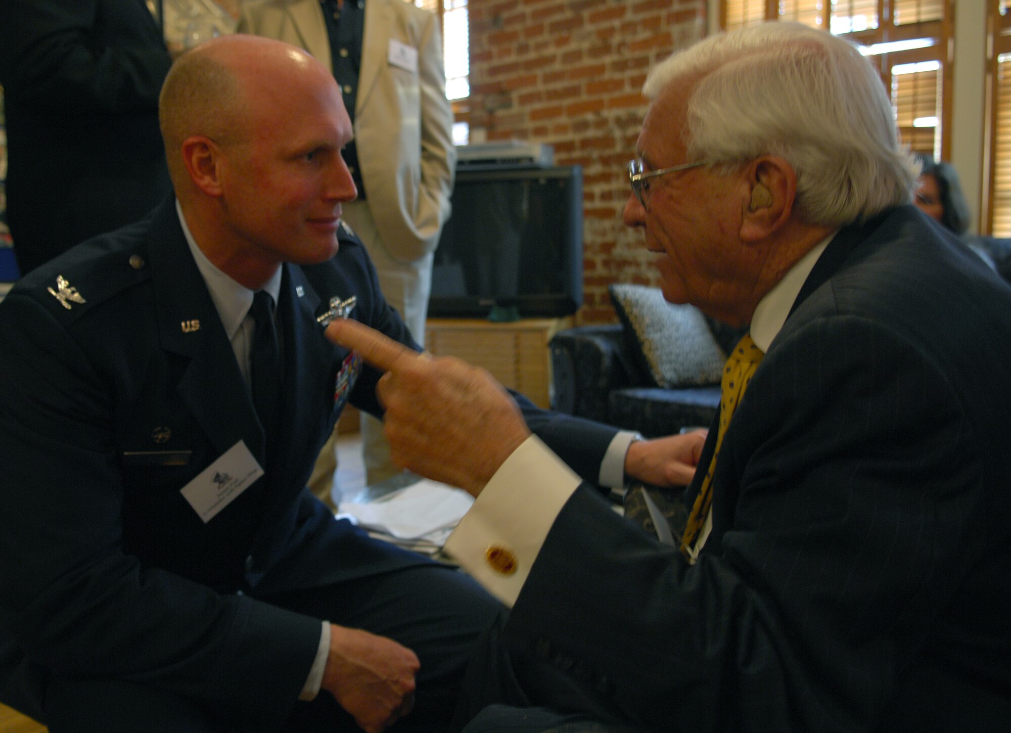 SHAW AIR FORCE BASE, S.C.--  Colonel James Post, 20th Fighter Wing Commander, speaks with South Carolina State Senator and former Ninth Air Force pilot John Drummond during Sumter County Legislative Day at the City Art Gallery, Columbia, SC, April, 2 2008.  Sumter Legislative Day provides the opportunity to display outstanding qualities and attributes of Sumter County. Shaw AFB is the largest employer in Sumter County.  (U.S. Air Force photo/SrA William Coleman)