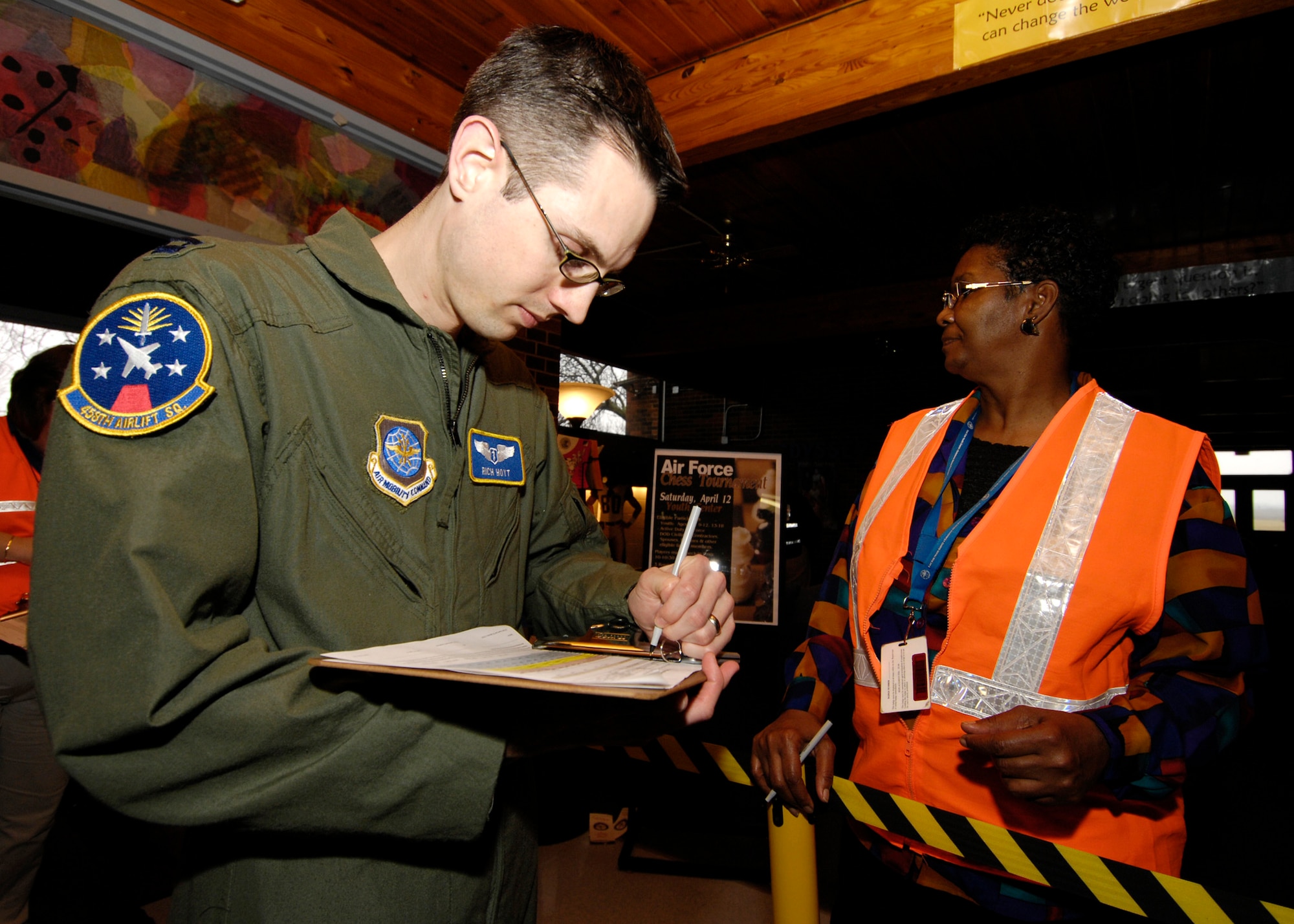 SCOTT AIR FORCE BASE, Ill. -- Capt. Richard Hoyt, 375th Aerospace Medical Squadron, checks in to the clinic after the Strategic National Stockpile Exercise was launched. The 375th Medical Support Squadron and the St. Clair County Health Department participated in this exercise that resulted in a successful joint operation. (U.S. Air Force photo/ Senior Airman Mildred Guevara)