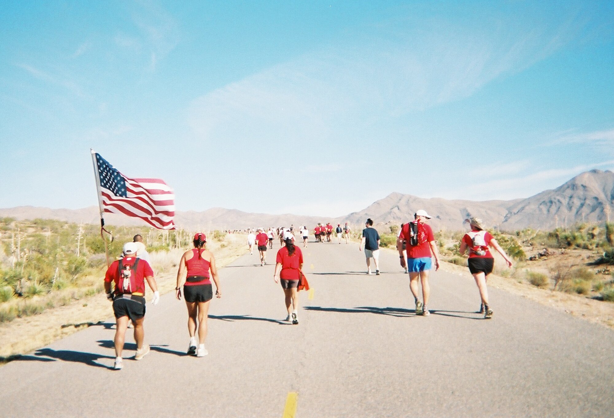 Random marchers make their way up the hills of White Sands during the 26.2-mile Bataan Death March Memorial Marathon on White Sands Missile Range, N.M. March 30. The marathon march is held annually in remembrance of approximately 75,000 Filipino and U.S. Soldiers who surrendered to the Japanese forces on the island of Luzon. Later on as prisoners of war, the surrendered were forced to march about 100 kilometers north to Nueva Ecija to Camp O'Donnell, a prison camp, in the scorching heat through the Philippine jungles. (Courtesy photo)