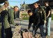 HOLLOMAN AIR FORCE BASE, N.M. -- Members of Team Holloman help tear down the brick wall surrounding Heritage Park here April 5. The wall was temporarily torn down to make room for the aircraft to enter the park. (U.S. Air Force photo by Airman Sondra M. Wieseler)