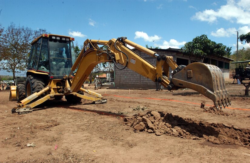 SOTO CANO AIR BASE, Honduras--Army Sgt. Jose G. Colon of the 756th Engineer Company from Ceiba, Puerto Rico, digs out the site of a new lavatory in Las Mesas, Honduras during Beyond the Horizon 2008. Host unit Joint Task Force-Bravo has  issued more than 8,000 gallons of fuel for BTH activities. (U.S. Army photo by Spc. Anthony Reagan )