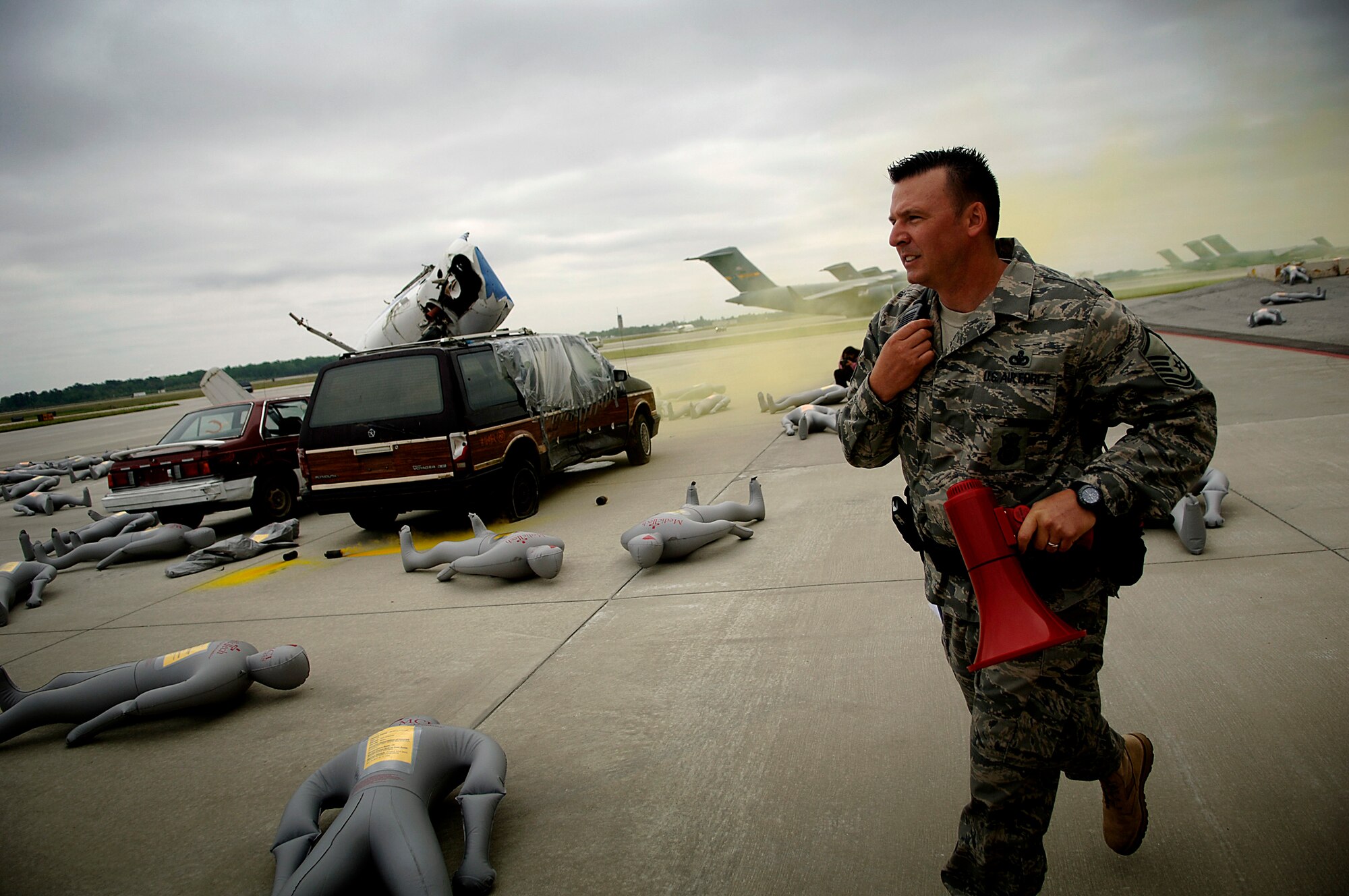 Master Sgt. Tony Mullins responds to a simulated aircraft accident on the Charleston AFB flightline Tuesday. Charleston Airmen participated in an exercise to prepare for the 2008 "Wings Over Charleston" Air Show. Sergeant Mullins is with the 437th Security Forces Squadron.  (U.S. Air Force photo/Senior Airman Nicholas Pilch)
