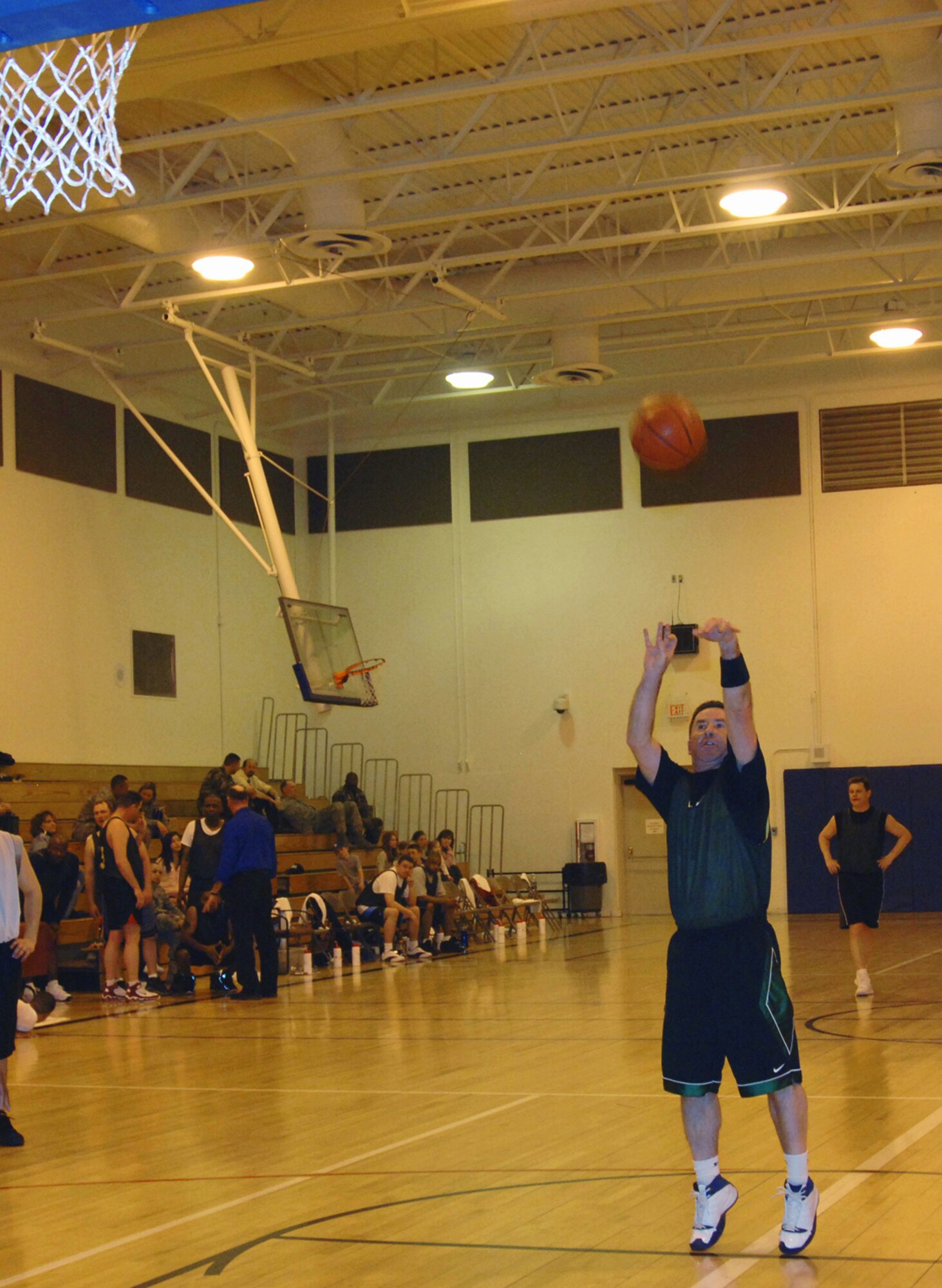 MOUNTAIN HOME AIR FORCE BASE, Idaho -- Darryl Ross, East All-star team, grabs a rebound from Chad Grant, East All-star team, during the All-star basketball game. The All-star basketball game and extravaganza, held at the Gunfighter Fitness Center April 4, concluded the basketball season. The game pitted the best player from the Intramural and Over 30 leagues against each other. The West All-star team defeated the East All-star team 111 to 89. (U.S. Air Force photo/ Senior Airman Megan P. Lyon)