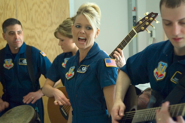 Members of the Air Force Heartland of America Band's Night Wing perform for servicemembers past and present April 5 at the James A. Haley Veterans' Hospital in Tampa, Fla. The band performed throughout the hospital to lift the spirits of military members.  Night Wing is an ensemble of the Heartland of America Band stationed at Offutt Air Force Base, Neb. (U.S. Air Force photo/Staff Sgt. Bennie J. Davis III) 
