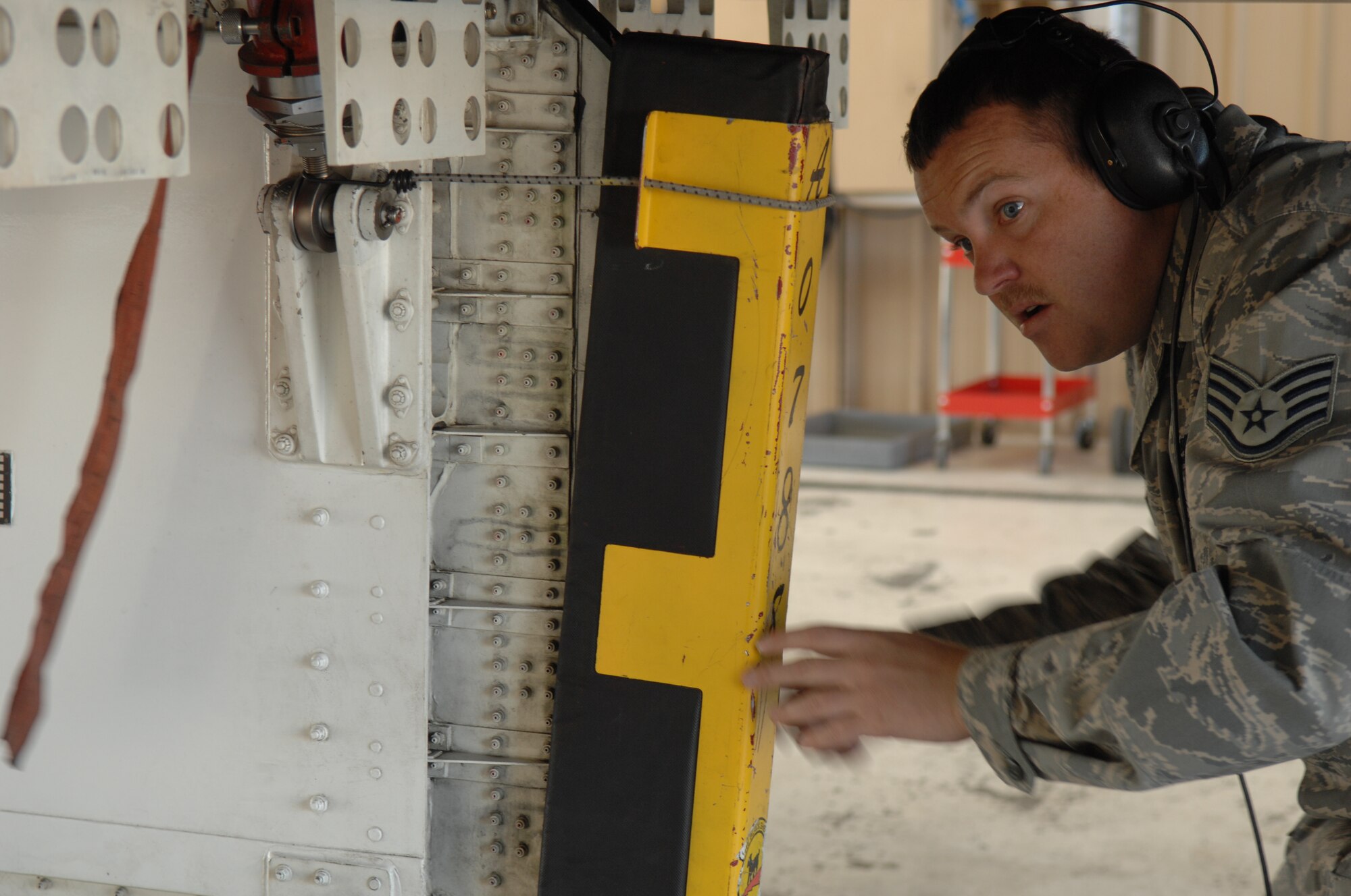 Staff Sgt. Eric Kennedy, 49th Aircraft Maintenance Squadron, removes the bomb bay door edge protectors, during his pre-flight inspection of a F-117A Nighthawk during Exercise Coronet Gold Rush 08-02 here March 28.
(U.S. Air Force photo/Senior Airman Anthony Nelson Jr)