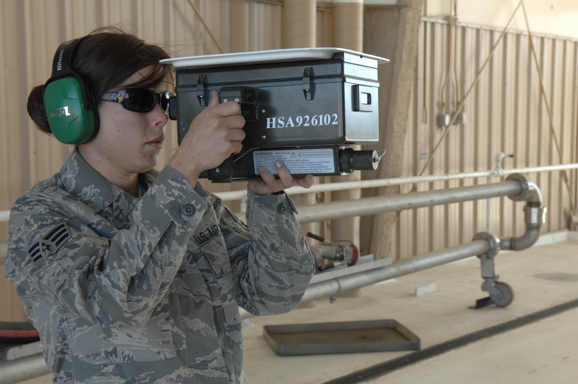 Senior Airman Misty Maricle, 49th Aircraft Maintenance Squadron, tests the IFF ( Identification friend/foe) signal, to make sure the aircraft can identify itself as a friendly aircraft during Exercise Coronet Gold Rush 08-02 here March 28. The box simulates an interrogator aircraft or ground station. This task is necessary to protect the jet from being shot down by friendly fire. (U.S. Air Force photo/Senior Airman Anthony Nelson Jr)
