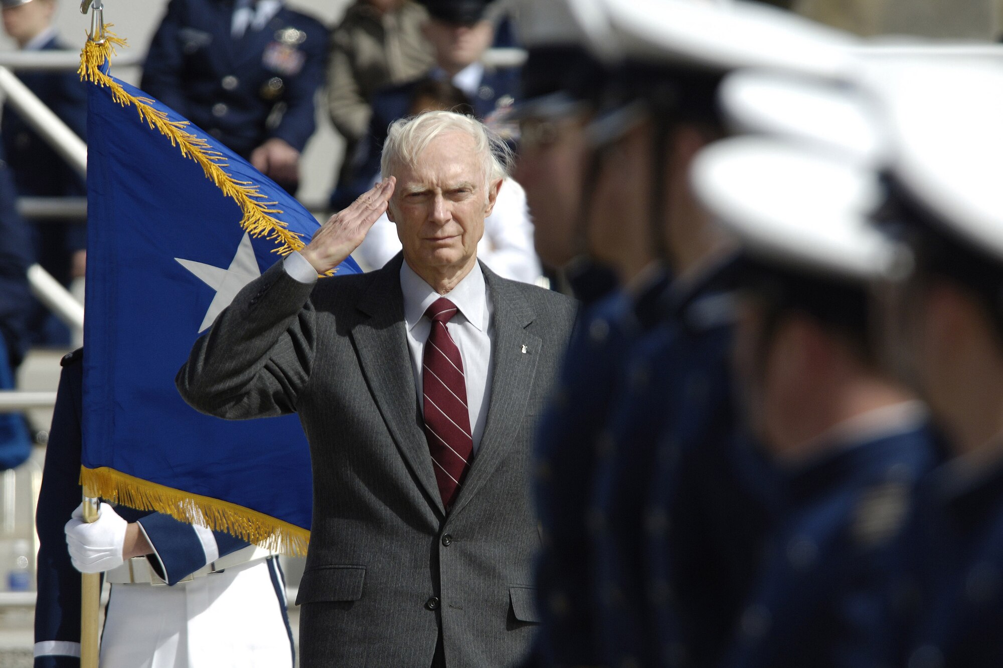 Retired Lt. Gen. Robert D. Beckel salutes during the pass in review of the cadet wing during the Founders Day and Sponsors Day Parade April 5 at the U.S. Air Force Academy in Colorado. The parade, serving two purposes, honored the authorization and founding of the Academy, which began construction July 11, 1955. The parade also honored the 3,500 cadet sponsors; those men, women and families who open their hearts and homes to members of the cadet wing to enhance cadet life and develop officers of character. General Beckel graduated with the class of 1959. (U.S. Air Force photo/Mike Kaplan)