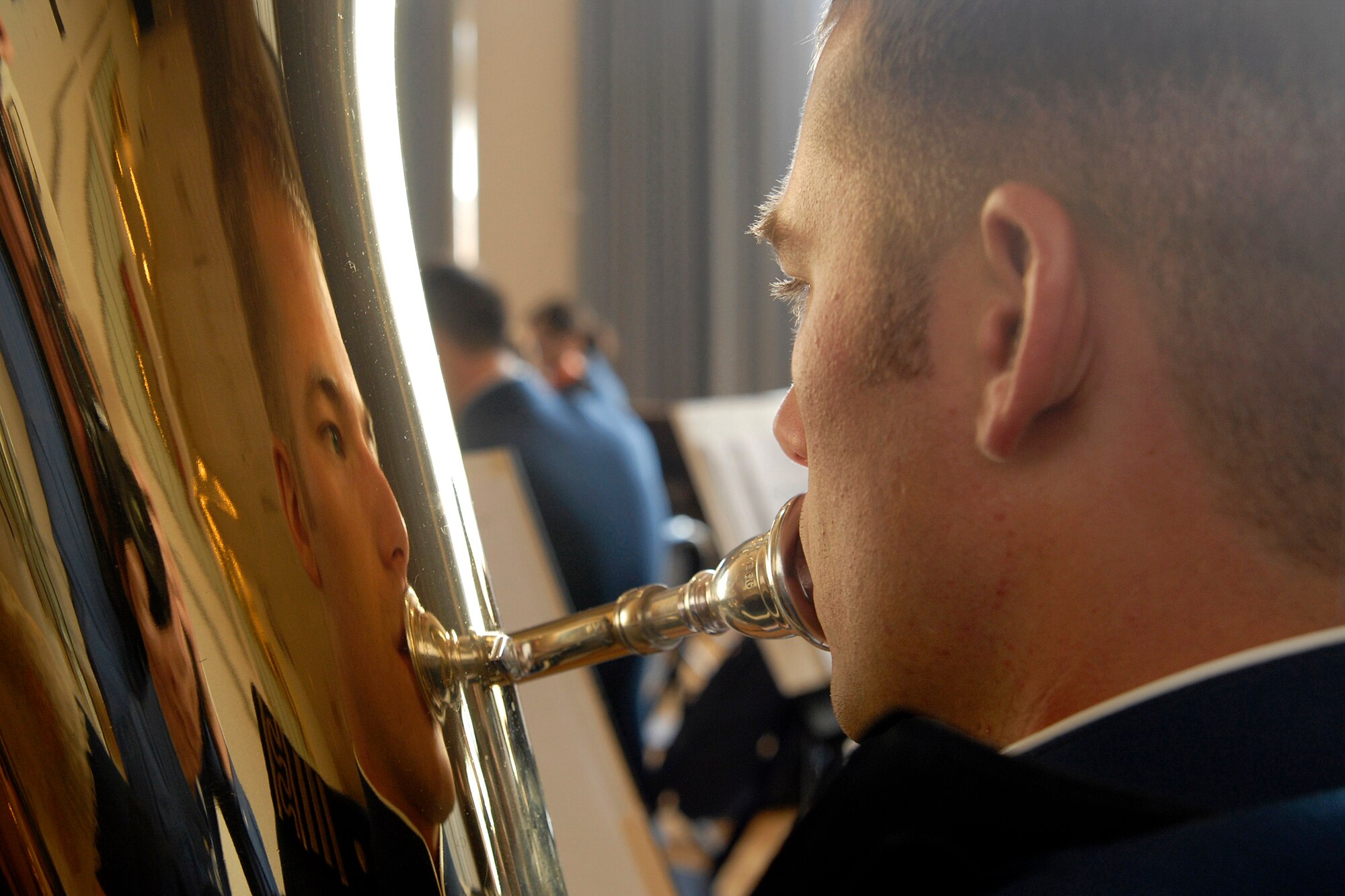 Senior Zachariah Thuli plays the tuba during the cadet sponsor social held April 5 in Arnold Hall at the U.S. Air Force Academy in Colorado. The social honored the 3,500 cadet sponsors; those men, women and families who open their hearts and homes to members of the cadet wing to enhance cadet life and develop officers of character. Cadet Thuli is a member of the Cadet Orchestra. (U.S. Air Force photo/Mike Kaplan) 
