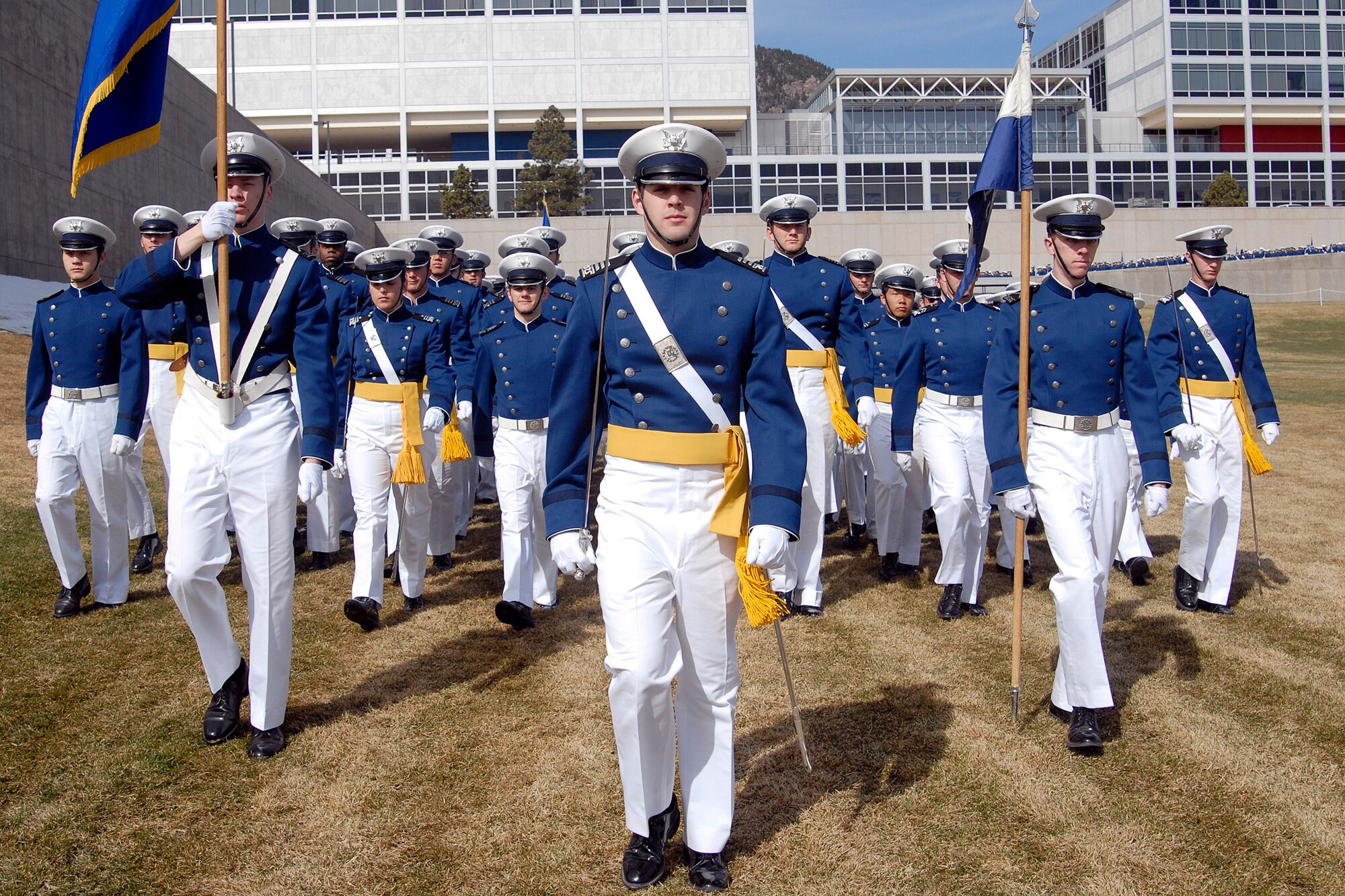Senior Christopher Jordan leads Cadet Squadron 16 onto the Stillman Parade Field for the Founders Day and Sponsors Day Parade April 5 at the U.S. Air Force Academy in Colorado. The parade, serving two purposes, honored the authorization and founding of the Academy, which began construction July 11, 1955. The parade also honored the 3,500 cadet sponsors; those men, women and families who open their hearts and homes to members of the cadet wing to enhance cadet life and develop officers of character. (U.S. Air Force photo/Mike Kaplan) 

