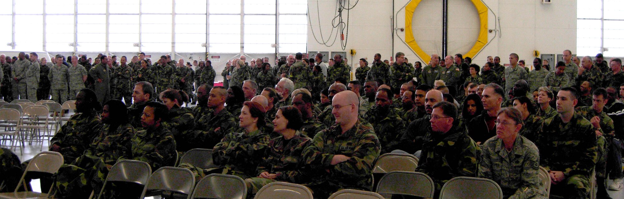 ANDREWS AIR FORCE BASE, Md. -- Hundreds of wing members filled Hangar 11 here April 6, in celebration of "Tribute to Troops," an event hosted by the 459th Mission Support Flight to thank returning troops for their various deployments during the last year. The event was emceed by Senior Airman Patrick Stout of the 69th Aerial Port Squadron. (U.S. Air Force photo/Staff Sgt. Amaani Lyle)