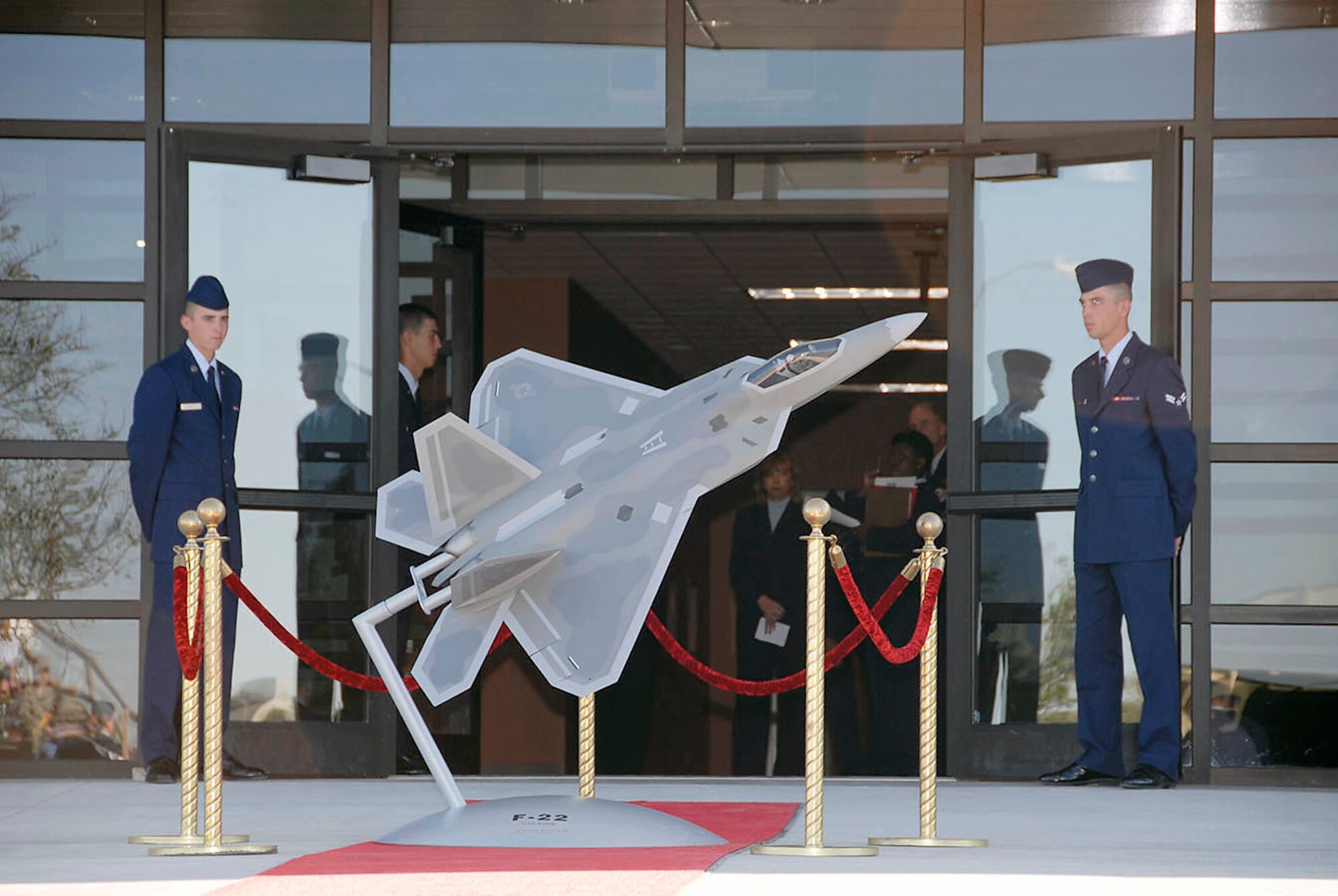 Airmen in training stand outside the new F-22 Raptor Maintenance Training Facility following the opening ceremony in October 2007 at Sheppard Air Force Base, Texas. (U.S. Air Force photo/Sandy Wassenmiller) 