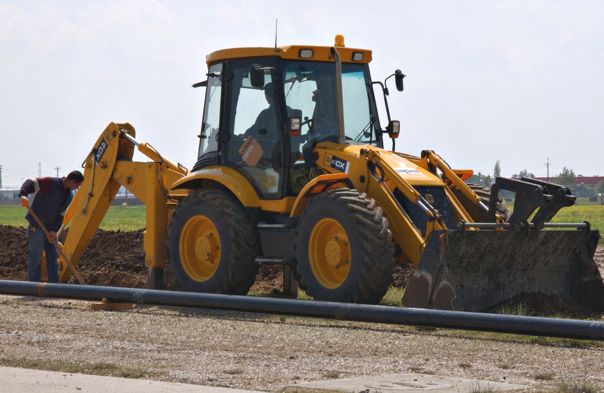 Contractors dig a ditch at the end of the 39th Air Base Wing's fllightline April 2. A fuel line will be placed in the ditch. Repairs to the runway are scheduled to be completed April 22. (U.S. Air Force photo by Airman 1st Class Benjamin Wilson)                