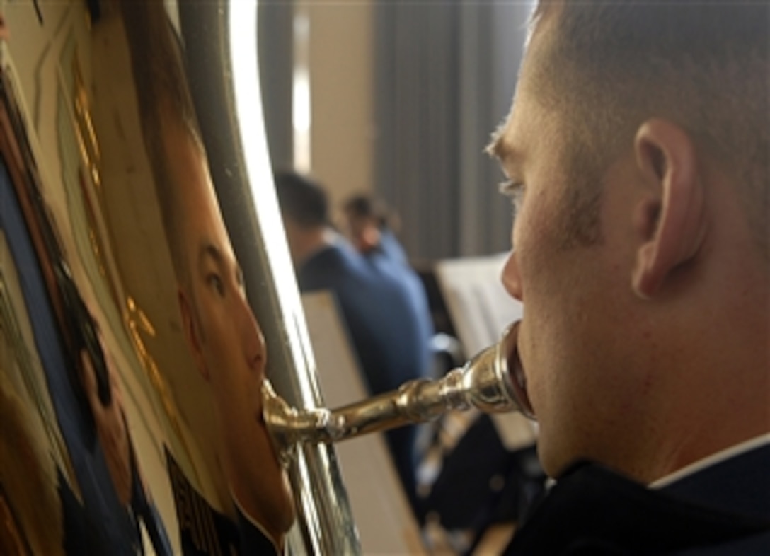 Senior Zachariah Thuli plays the tuba during a reception to honor 3,500 cadet  sponsors April 5, 2008, at the U.S. Air Force Academy in Colorado.