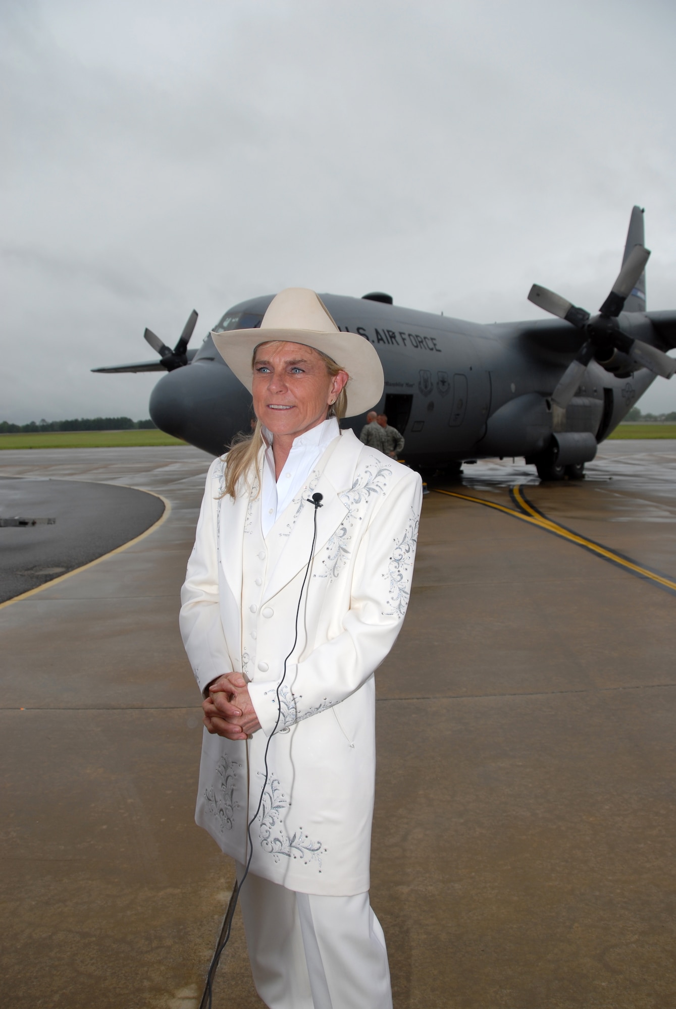 Jett Williams, daughter of country music legend Hank Williams, grants media interviews on the Maxwell AFB, Ala., flightline at the 908th Airlift Wing's celebration of the 60th anniversary of the Air Force Reserve at Maxwell AFB, Ala., April 5, 2008. Along with celebrating the Air Force Reserve's diamond anniversary, the Montgomery, Ala.-based 908th AW honored Hank Williams by changing the unit's C-130 cargo planes' radio call sign to "Hank" and painting "Ramblin' Man" over the door of one of the aircraft.  (U.S. Air Force photo by Mr. Jeff Melvin)