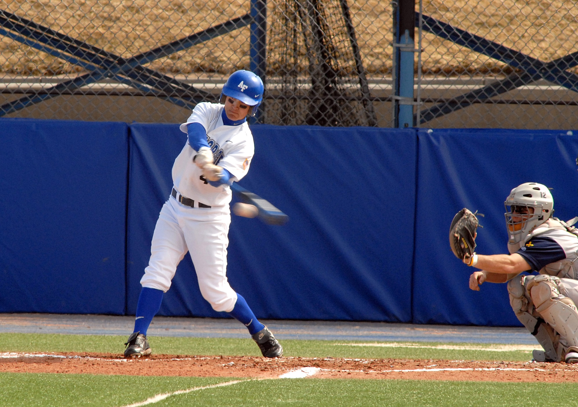 Senior center fielder Jake Allen connects on a pitch as the Falcons rallied to a 10th inning 9-8 win against Colorado Christian in non conference baseball action at the Academy's Falcon Field. Air Force tallied 12 hits and did not commit an error in the field on the day. The Falcons improve to 11-19 on the season. (U.S. Air Force photo/Dave Ahlscwhede)