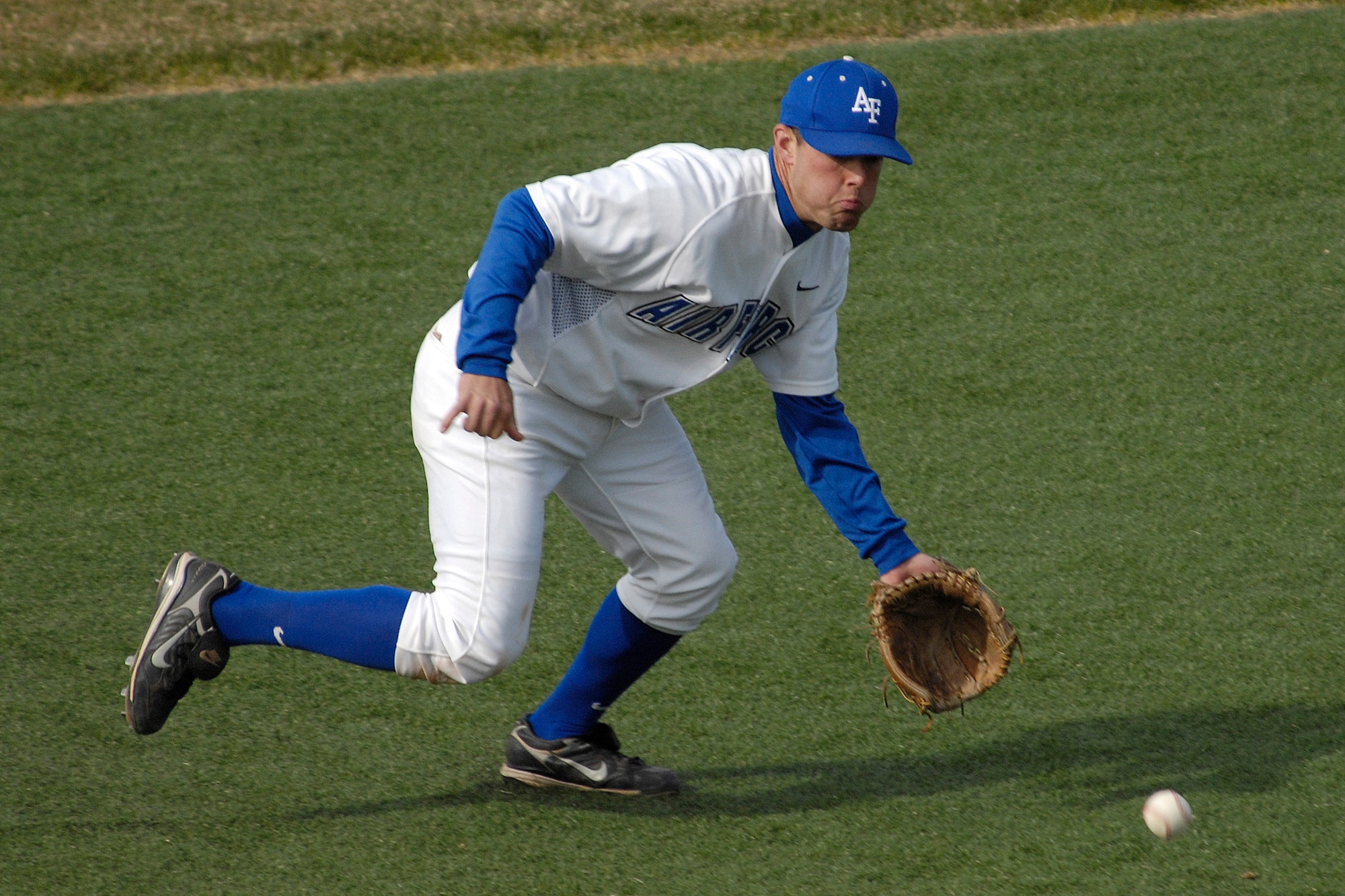 Junior third baseman Jason Griggs scoops up a ground ball as the Falcons rallied to a 10th inning 9-8 win against Colorado Christian in non conference baseball action at the Academy's Falcon Field. Griggs went 2 for 3 at the plate as Air Force tallied 12 hits and did not commit an error in the field on the day. The Falcons improve to 11-19 on the season. (U.S. Air Force photo/Mike Kaplan)
