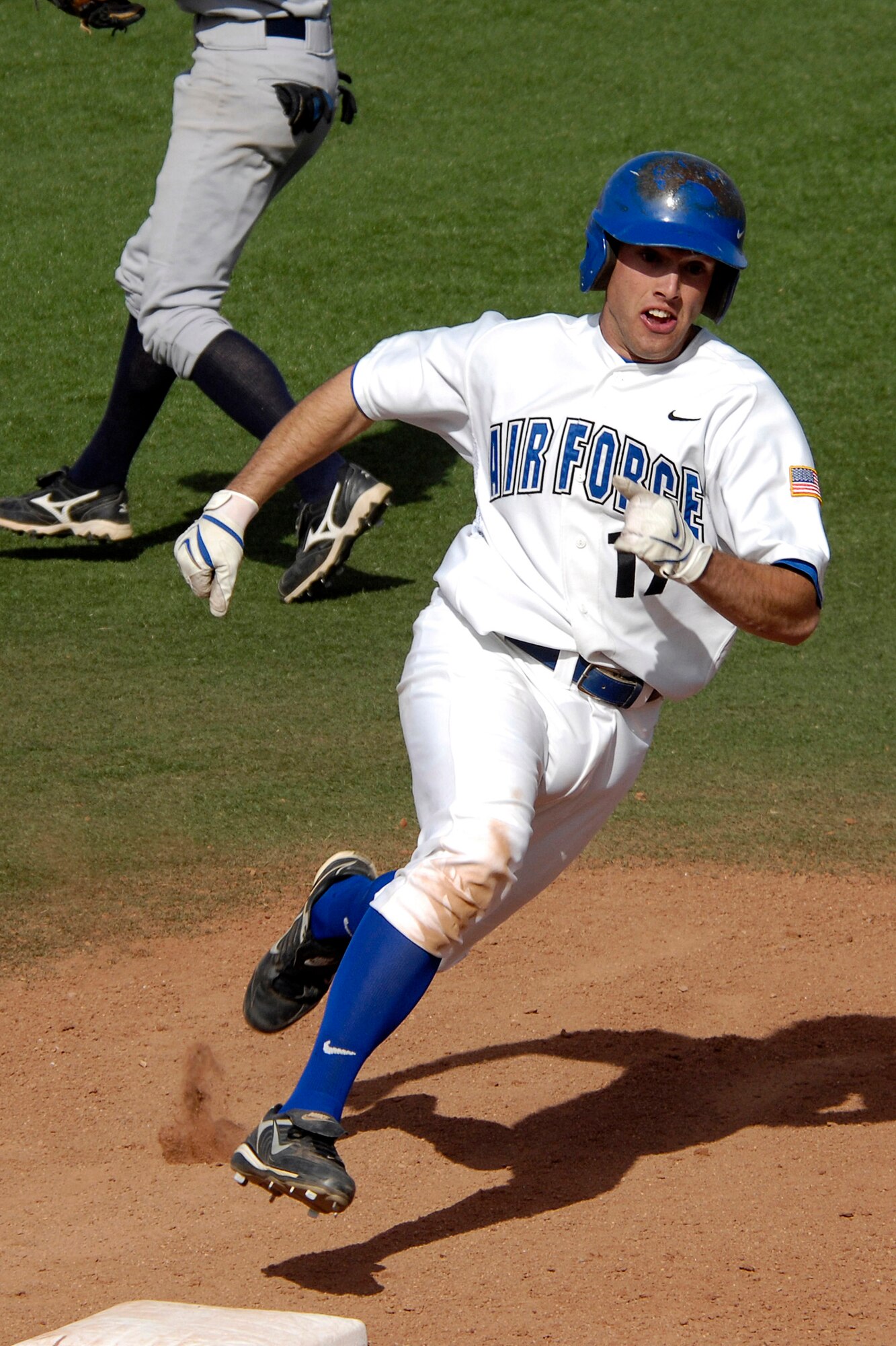 Junior third baseman Jason Griggs rounds third base headed for an RBI as the Falcons rallied to a 10th inning 9-8 win against Colorado Christian in non conference baseball action at the Academy's Falcon Field. Griggs went 2 for 3 at the plate as Air Force tallied 12 hits and did not commit an error in the field on the day. The Falcons improve to 11-19 on the season. (U.S. Air Force photo/Mike Kaplan)