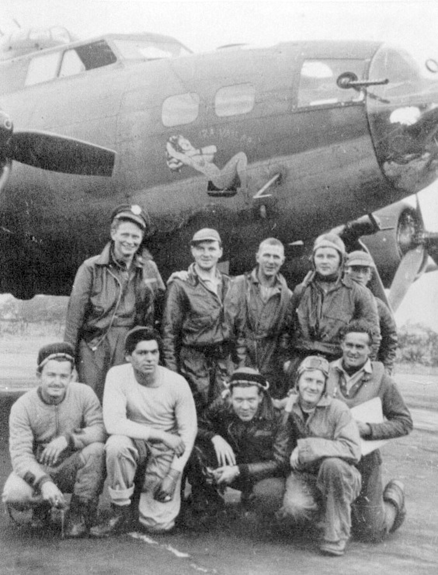 The crew of Capt Robert W. Cogswell on August 17, 1943 standing in front of their B-17F  "Iza Vailable."  Then Technical Eddie Deerfield, (2nd from left front row) compiled the volume donated to the RAF Alconbury Base library as Editor of the Hell's Angels Newsletter.  (Photo courtesy 303rd Bomb Group Association) 