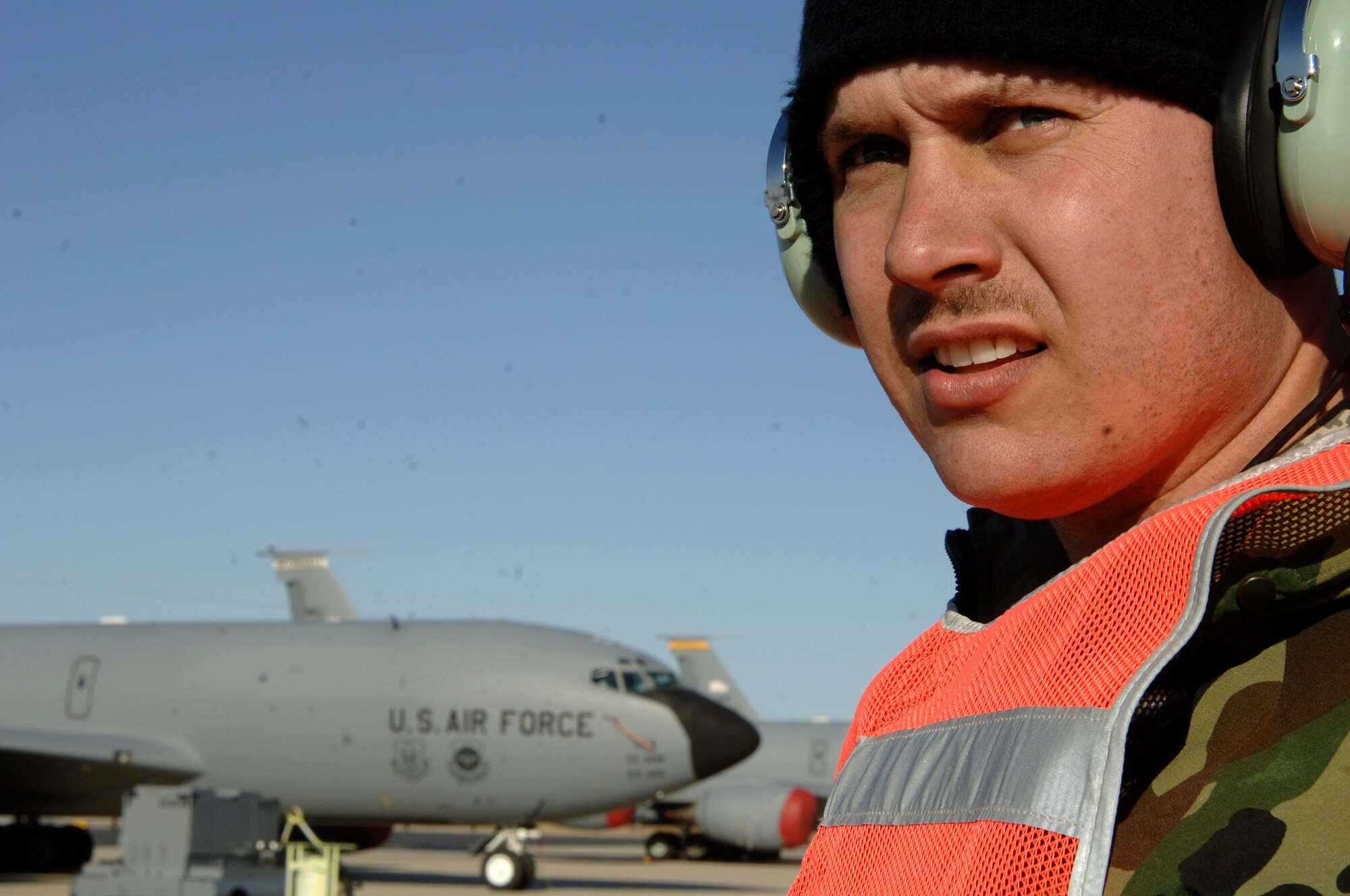 VOLK FIELD AIR NATIONAL GUARD BASE, Wis. -- Tech. Sgt. Joe Healy, a maintainer from McConnell watched for a KC-135 Stratotanker to taxi on April 1 at an exercise in Volk Field.  Maintainers are responsible for the upkeep and daily care of the aircrafts. (Photo by Tech. Sgt. Chyrece Campbell)