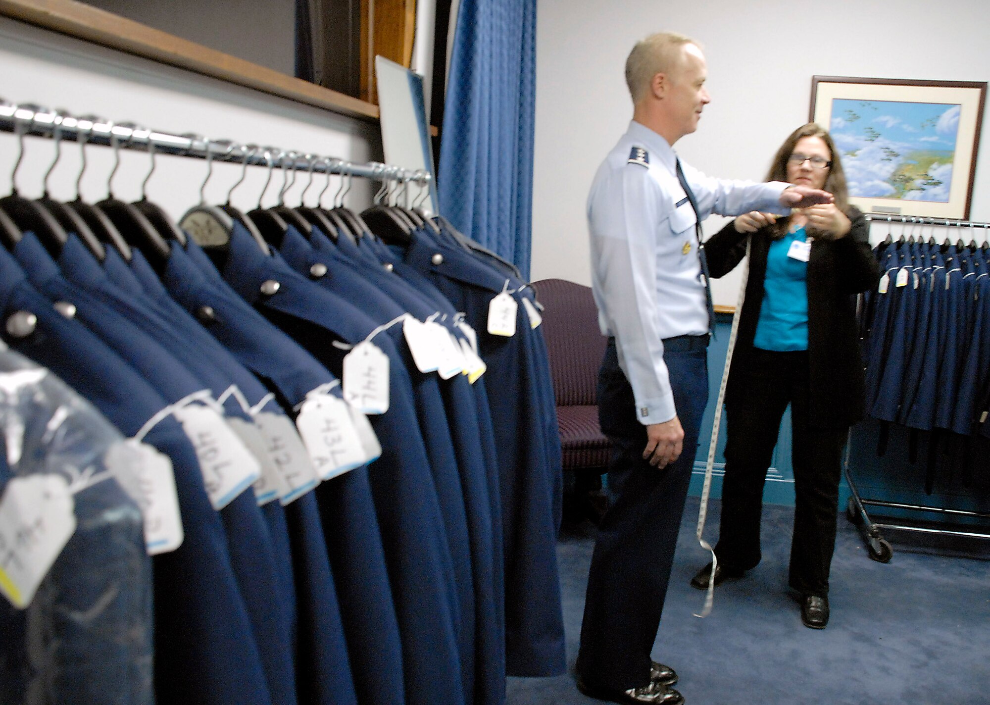 Lt. Gen. Richard Y. Newton III gets measured during a heritage coat fit/wear test April 8 at the Pentagon. Measurements from various Airmen were collected by members of the Air Force Uniform Program Office so any fit adjustments can be made before the heritage service coats get field tested throughout the Air Force. General Newton is the Air Force chief of staff of manpower and personnel. (U.S. Air Force photo/Staff Sgt. Julie Weckerlein) 