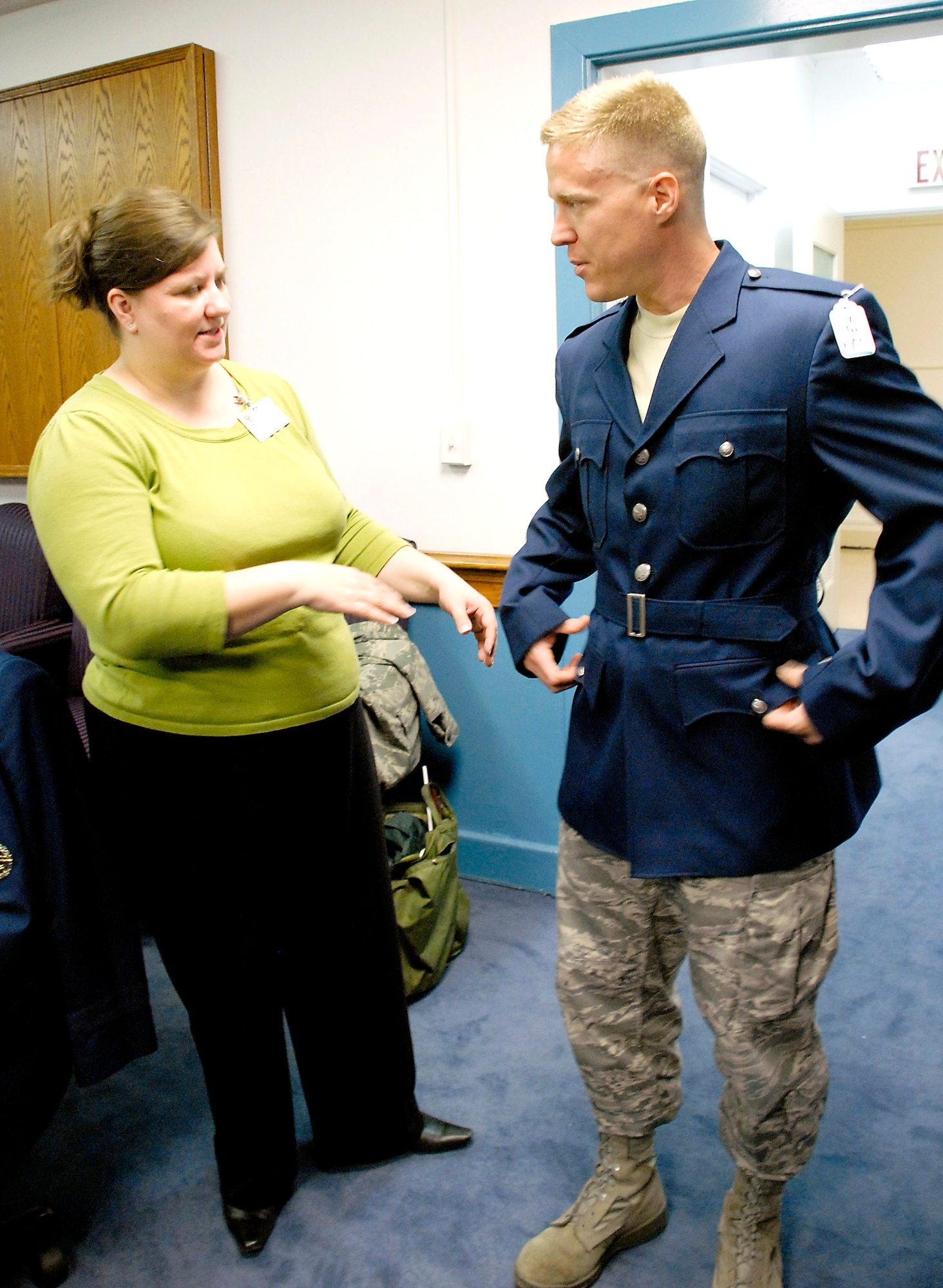 Lt. Col. Jeff Yocum tries on a heritage coat during a fit/wear test April 8 at the Pentagon. Measurements from various Airmen were collected by members of the Air Force Uniform Program Office so any fit adjustments can be made before the heritage service coats get field tested throughout the Air Force. Colonel Yocum is the Air Force chief of staff manpower and personnel executive officer. (U.S. Air Force photo/Staff Sgt. Julie Weckerlein) 