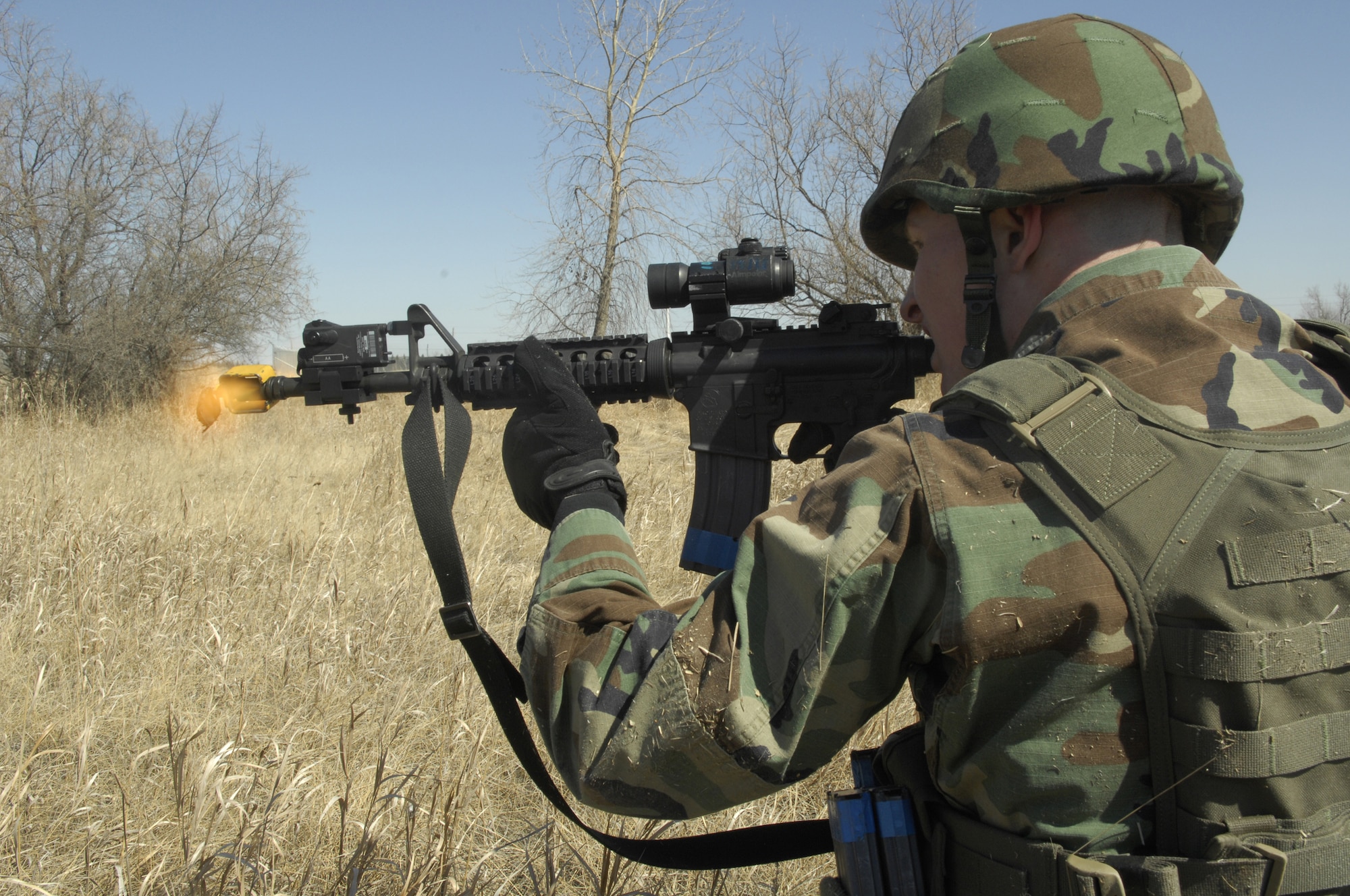 MINOT AIR FORCE BASE, N.D. -- 1st Lt. Timothy Slater, 91st Missile Security Forces Squadron, takes part in a tactical firing exercise here  April 7, to prepare for the upcoming Guardian Challenge exercise in May. (U.S. Air Force photo by Airman 1st Class Jesse Lopez)
