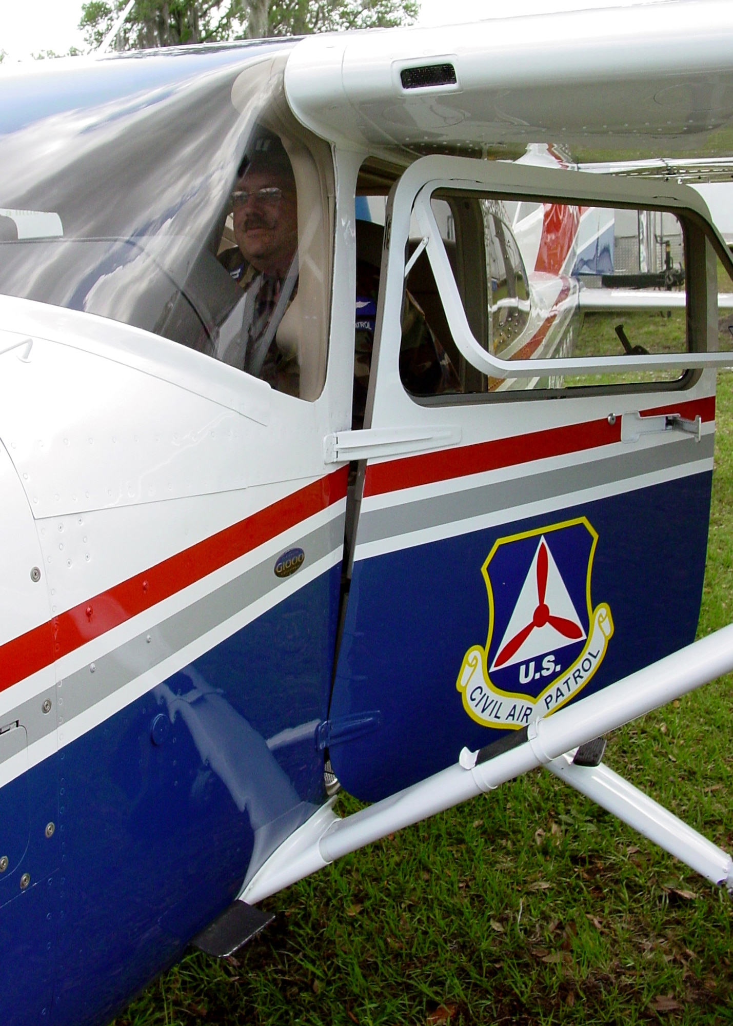 Civil Air Patrol Captain Len Goellner sits in the cockpit of a Florida Civil Air Patrol Cessna 182-T here.  As a precautionary measure the Air Force Rescue Coordination Center and CAP have pre-positioned aircraft and Airmen to provide search and rescue services if needed.  US Air Force photos by Mike Strickler.               
