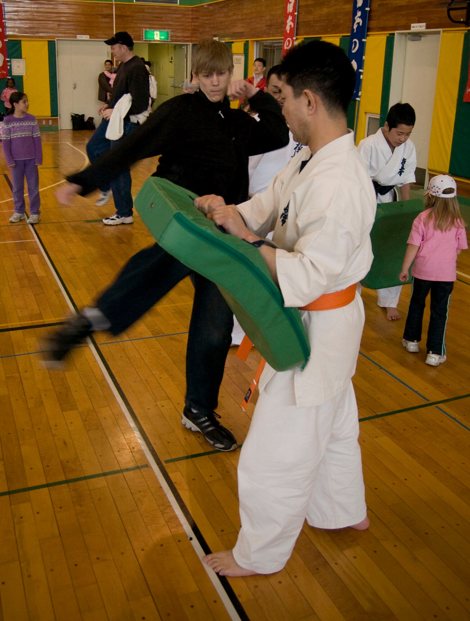 MISAWA AIR BASE, Japan – Christopher Haylett kicks a practice pad in the Edgren High School gymnasium on April 5, 2008. Christopher was given the opportunity to try karate, a Japanese martial art, during the karate school’s demonstration. (U.S. Air Force photo by Senior Airman Samuel Morse)