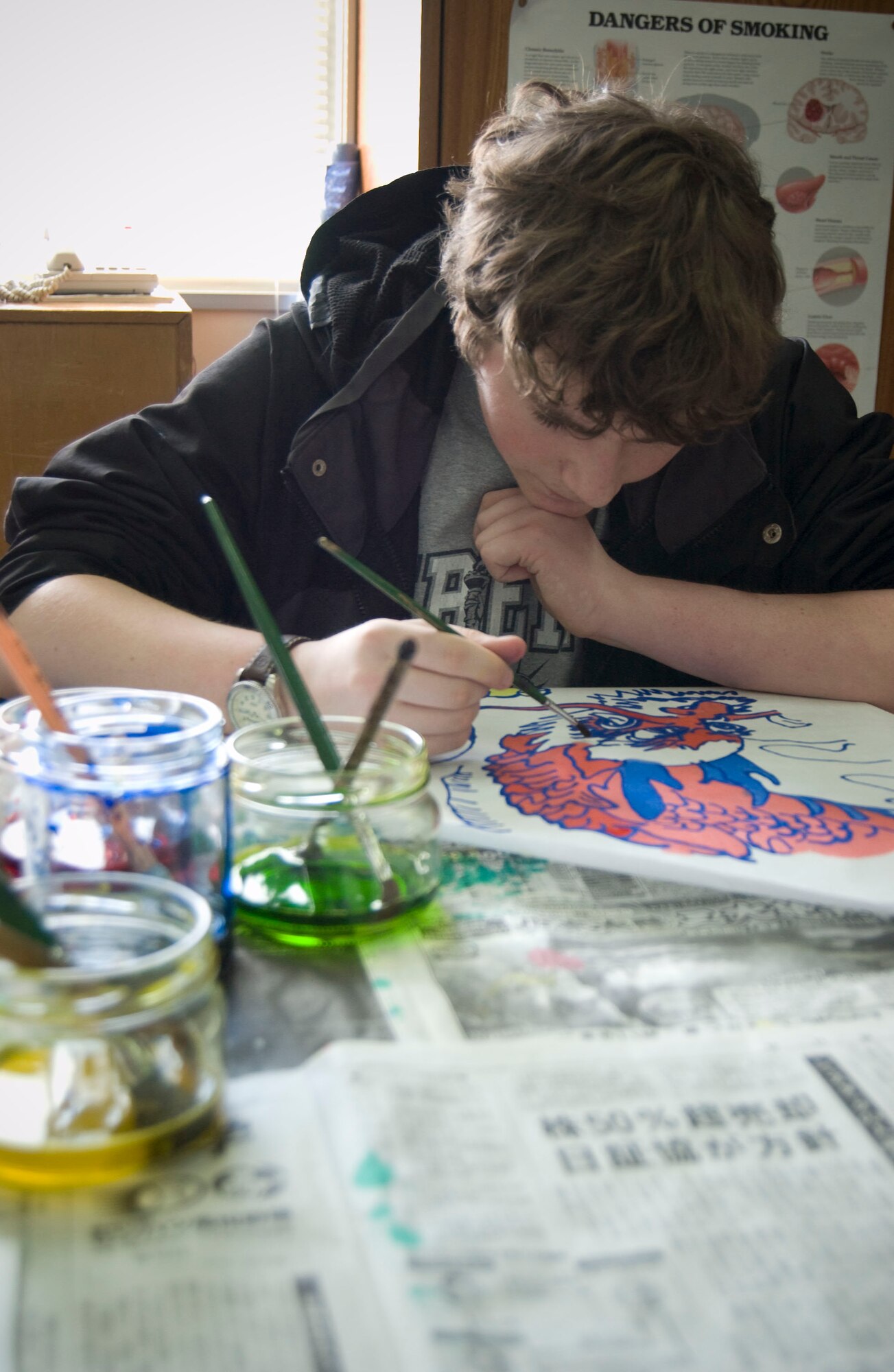 MISAWA AIR BASE, Japan – Sean Hrudicka paints a kite at Edgren High School on April 5, 2008. Many children had opportunities to create traditional Japanese crafts during this “Japan Day” at Misawa Air Base. (U.S. Air Force photo by Senior Airman Samuel Morse)
