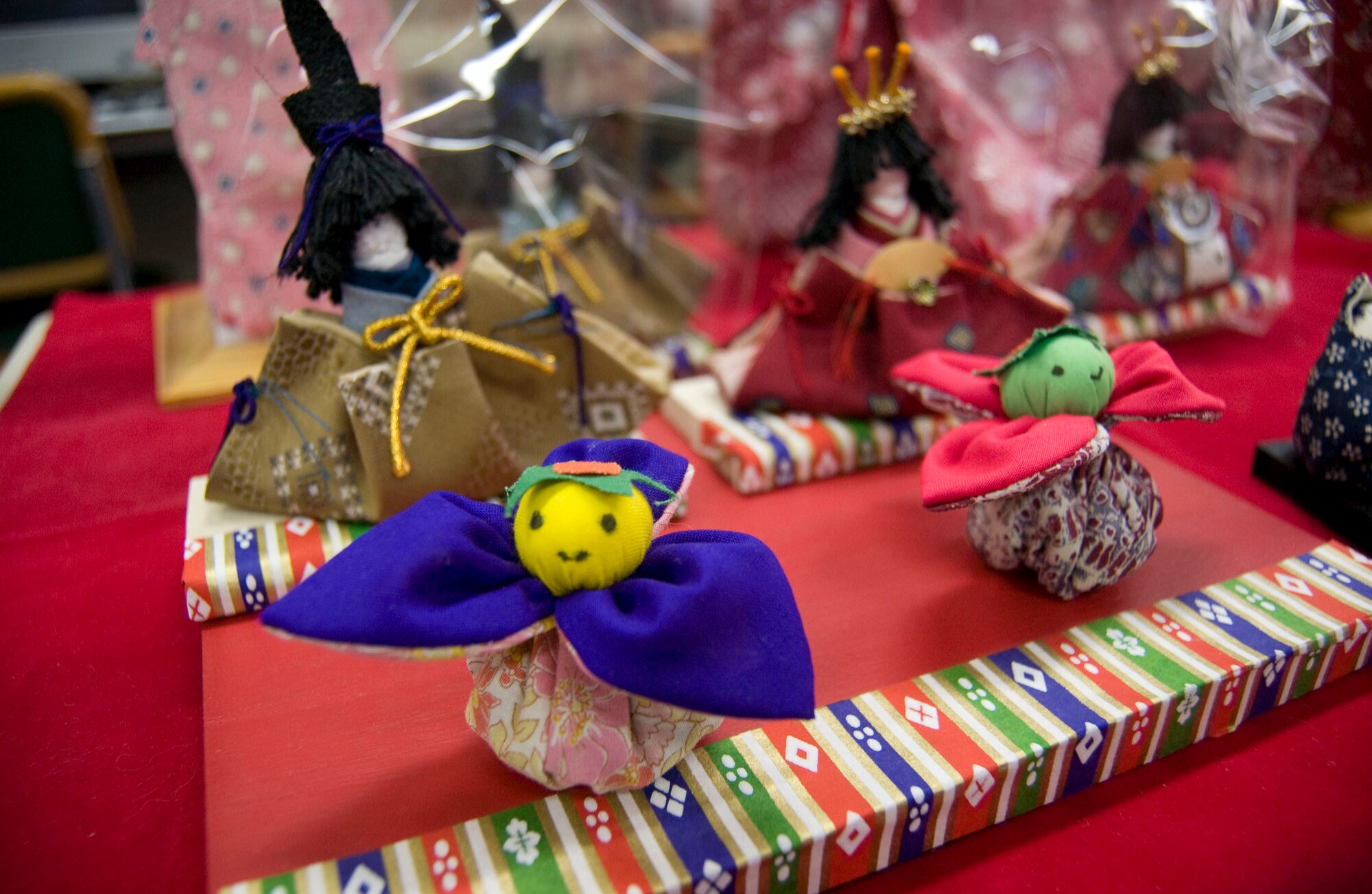 MISAWA AIR BASE, Japan – Hina ningyo, a set of dolls dressed in ancient costumes, are displayed at Edgren High School during “Japan Day” on April 5, 2008. The dolls are traditionally displayed with peach blossoms on Hinamatsuri or “Girls Day”. (U.S. Air Force photo by Senior Airman Samuel Morse)