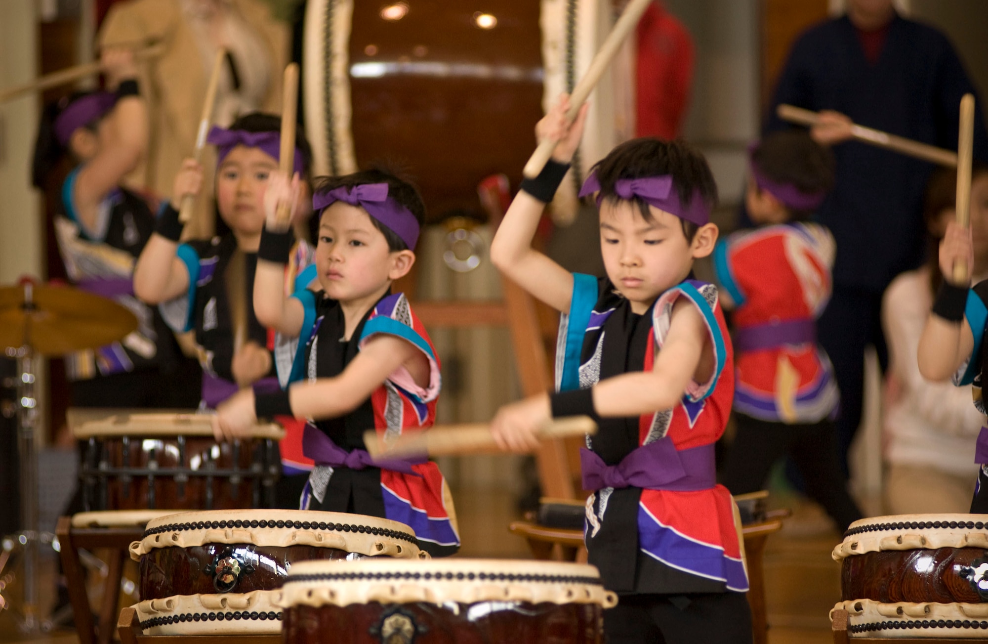 MISAWA AIR BASE, Japan -- Members of the Makibano Kids Drummers group showcase their talent in the Edgren High School gymnasium on April 5, 2008. The children played the taiko drums as part of the opening ceremony of "Japan Day" at Misawa Air Base. (U.S. Air Force photo by Senior Airman Samuel Morse)