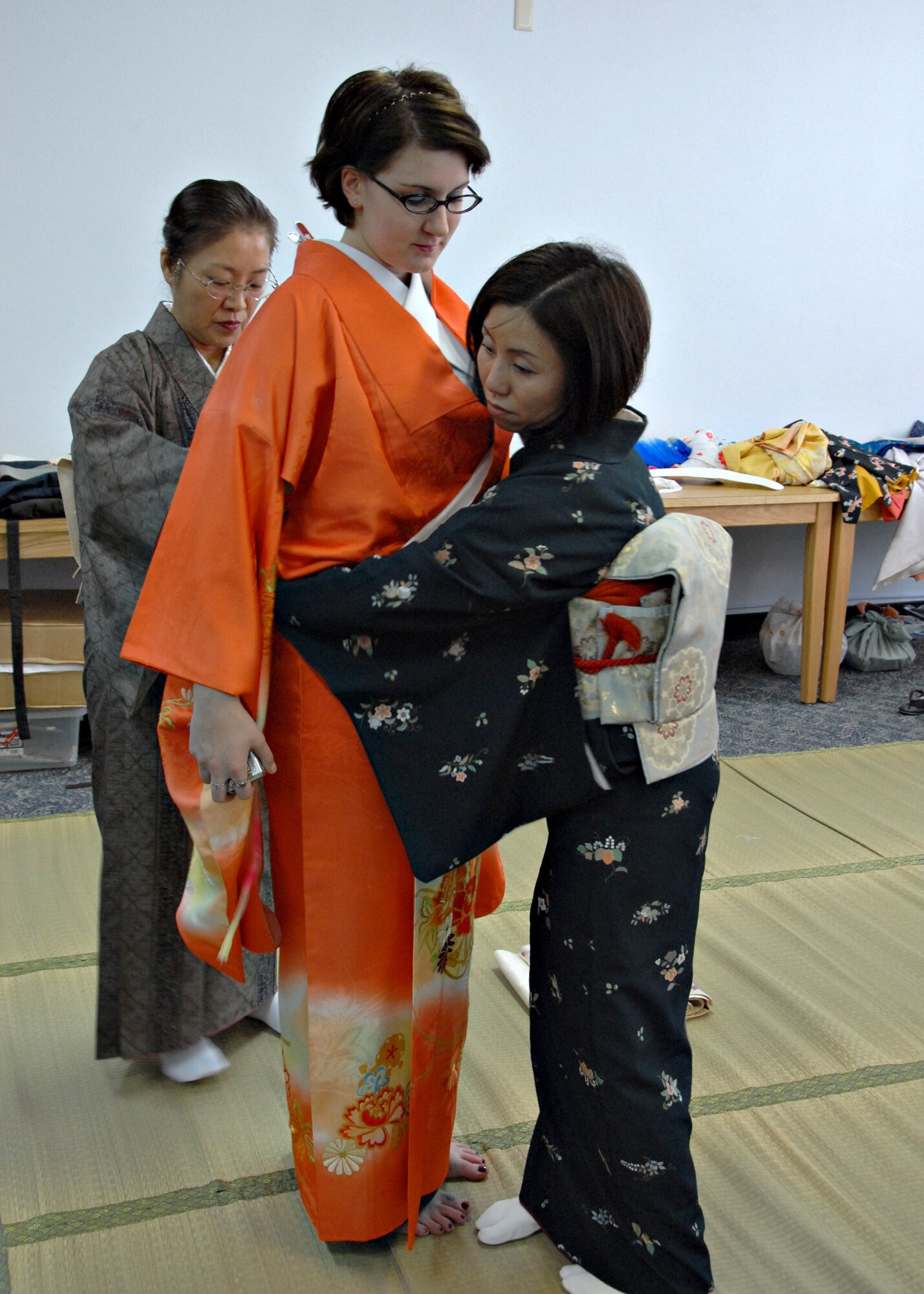 MISAWA AIR BASE, Japan – Breeanne Terry is dressed in a Kimono by Japanese women during Japan Day here April 5, 2008. The Nakaguki kimono wearing display was one of the more popular events, especially among women. (U.S. Air Force photo by Staff Sgt. Rachel Martinez)