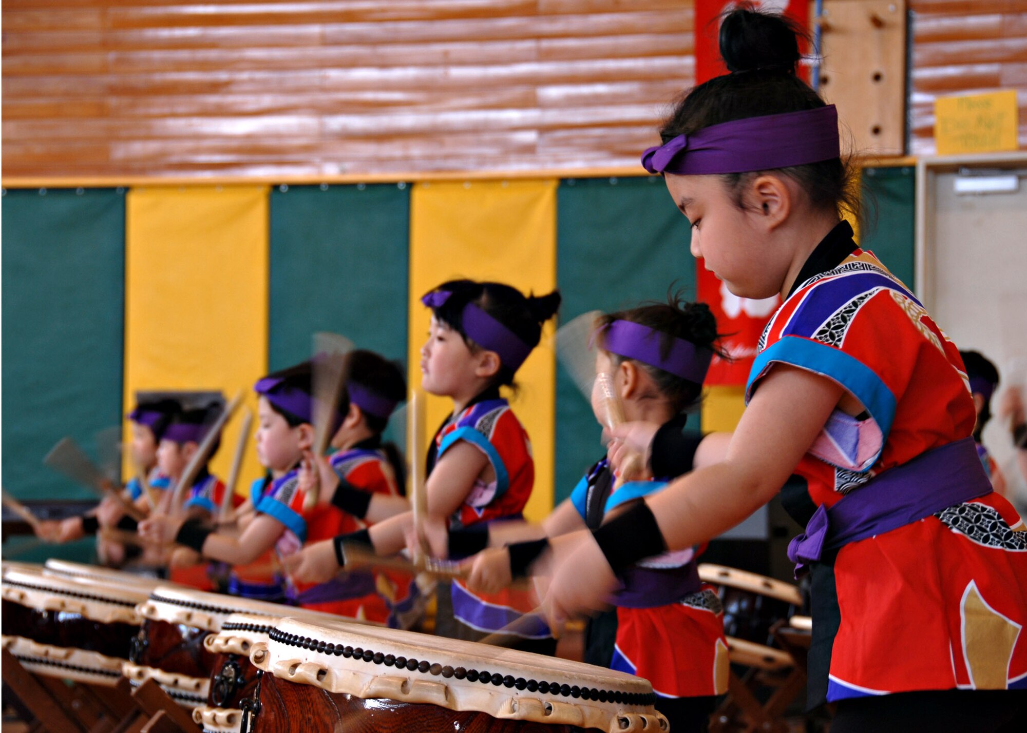 MISAWA AIR BASE, Japan – Makibano children drummers perform a musical piece on the Taiko drums during Japan Day here April 5, 2008. Additional stage shows throughout the day included Okamisawa sacred music and dancing, Yosokoi Soran dancing, Nishizuka Nambu local dancing, traditional Japanese dancing, and Nebuta music and dancing. (U.S. Air Force photo by Staff Sgt. Rachel Martinez)