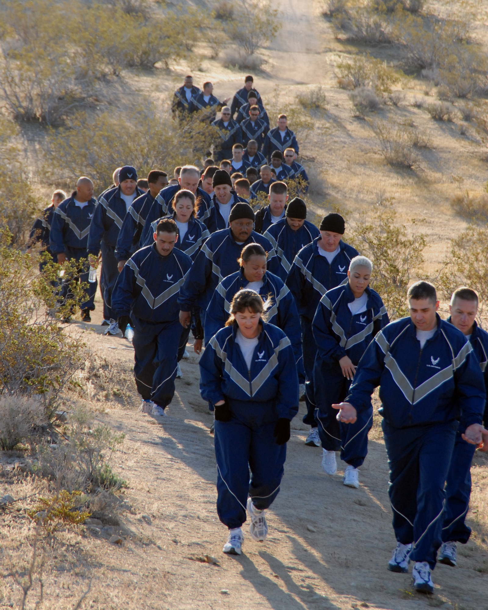 A group of about 65 Team Edwards senior noncommissioned officers hike a portion of the Mojave Desert here April 11. The 4.5-mile fitness walk and hike was a variation of the senior NCOs' monthly "Fit to Fight" team building exercise.  (Air Force photo by Master Sgt. Eric M. Grill)