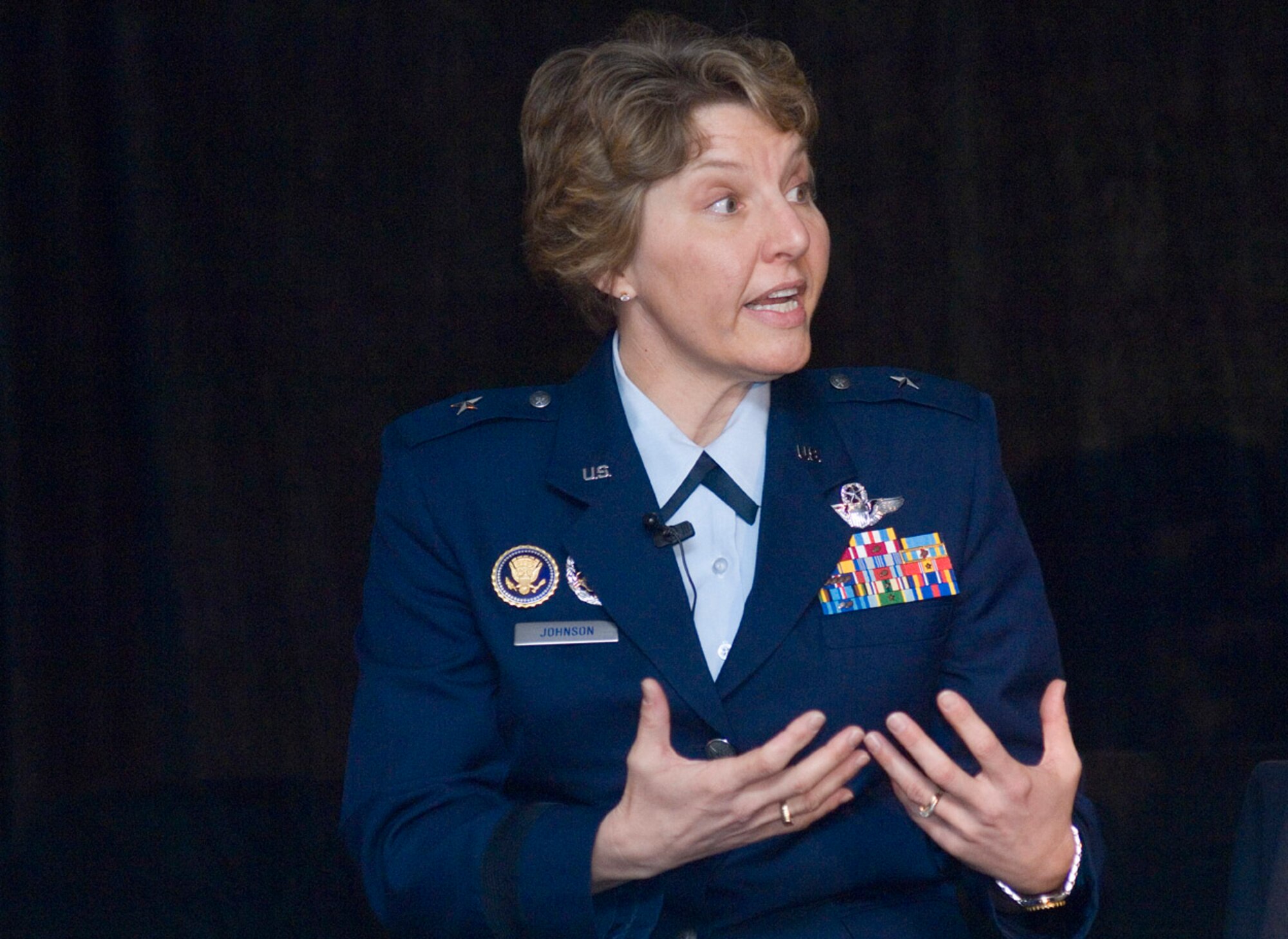 Brig. Gen. Michelle Johnson speaks during "Conversations of Influence" a NCAA Women's Final Four basketball tournament event with civil leaders and executives of Tampa, FL. April 7. General Johnson was selected by the NCAA to speak to woman athletes and participate at numerous NCAA events before the 2008 NCAA Woman's Final Four basketball tournament. She is the most decorated female athlete in Air Force Academy history. General Johnson is the deputy director for the war on terrorism in the Strategic Plans and Policy Directorate of the Joint Staff at the Pentagon in Washington. (U.S. Air Force photo/Staff Sgt. Bennie J. Davis III)