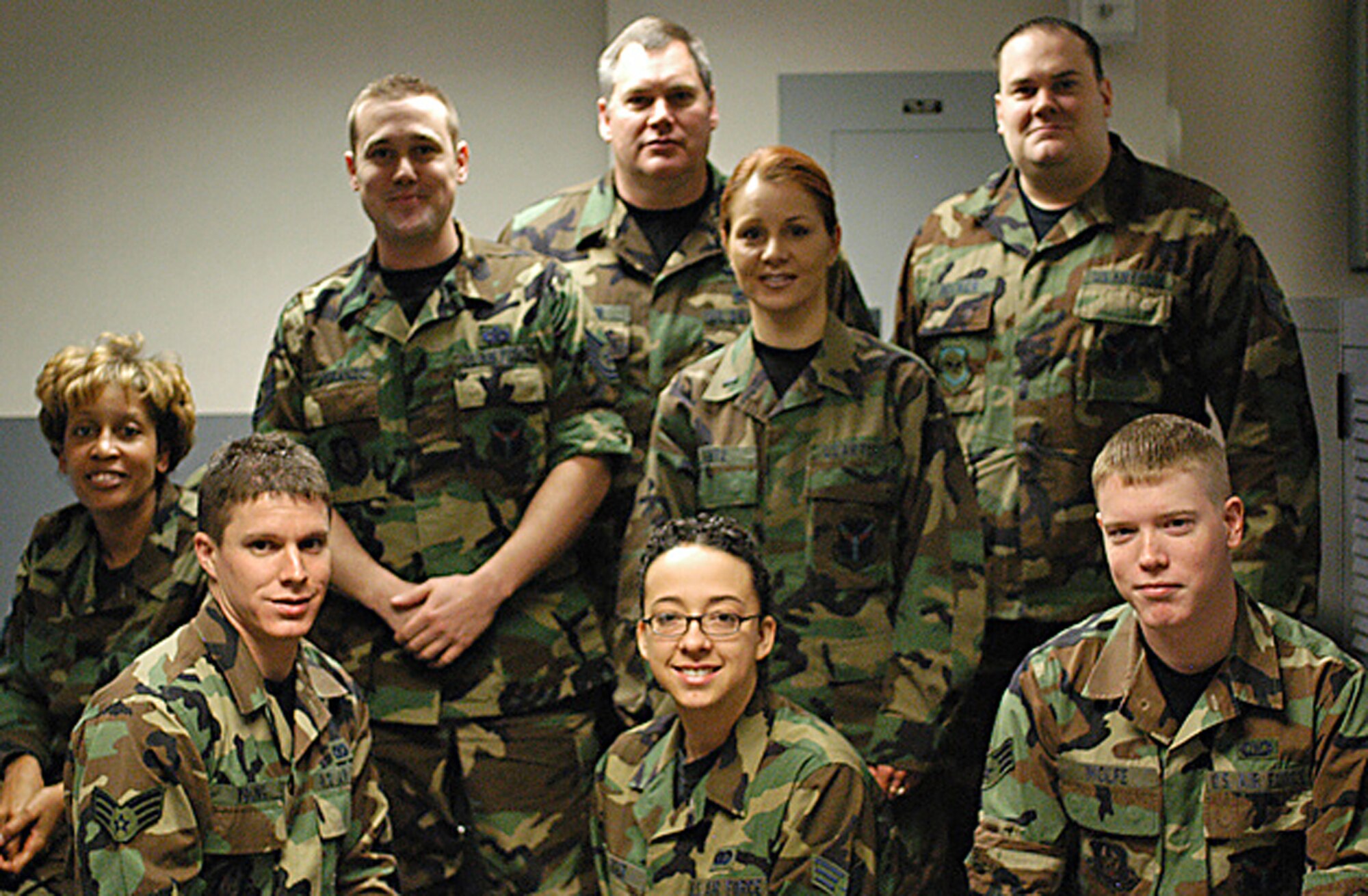 The 911th Airlift Wing Command Post has won the 22nd Air Force Command and Control Command Post of the Year Award for the second year in a row. The Command
Post staff shown above are listed from left to right, front to back: Staff Sgt. Rhonda Carter, Senior Airman Ryan Young, Senior Airman Sunshine Eger, Senior Airman
Matthew Wolfe, Tech. Sgt. Milo Sporanzo, 1st Lt. Laurie Lance, Senior Master Sgt. Brian Miller, Staff Sgt. Derek Becker. (U.S. Air Force Reserve photo/Senior Airman Tammy Cario)