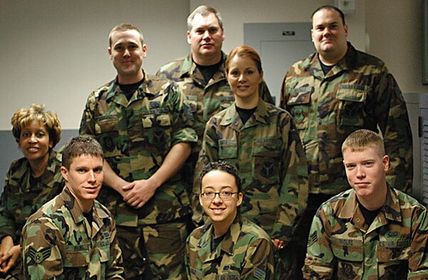 The 911th Airlift Wing Command Post has won the 22nd Air Force Command and Control Command Post of the Year Award for the second year in a row. The Command
Post staff shown above are listed from left to right, front to back: Staff Sgt. Rhonda Carter, Senior Airman Ryan Young, Senior Airman Sunshine Eger, Senior Airman
Matthew Wolfe, Tech. Sgt. Milo Sporanzo, 1st Lt. Laurie Lance, Senior Master Sgt. Brian Miller, Staff Sgt. Derek Becker. (U.S. Air Force Reserve photo/Senior Airman Tammy Cario)