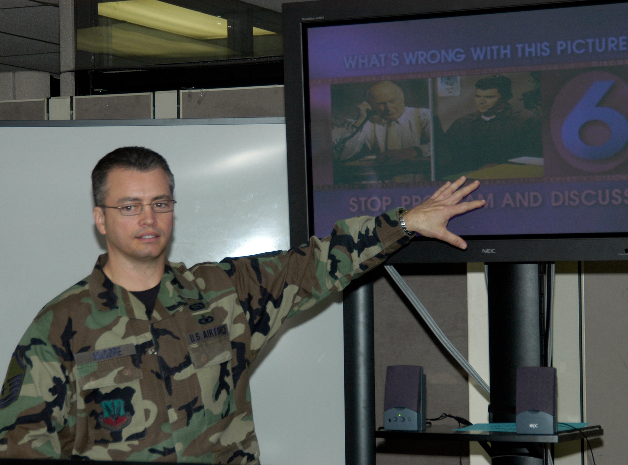 Master Sgt. Roger Madore, DPS, teaches phone etiquette training at the Air Reserve Personnel Center on April 4. The class is open to all ARPC employees and is centered around interactive videos which allow the students to share their experiences and techniques to effectively deal with difficult callers. (U.S. Air Force photo/Mike Molina)