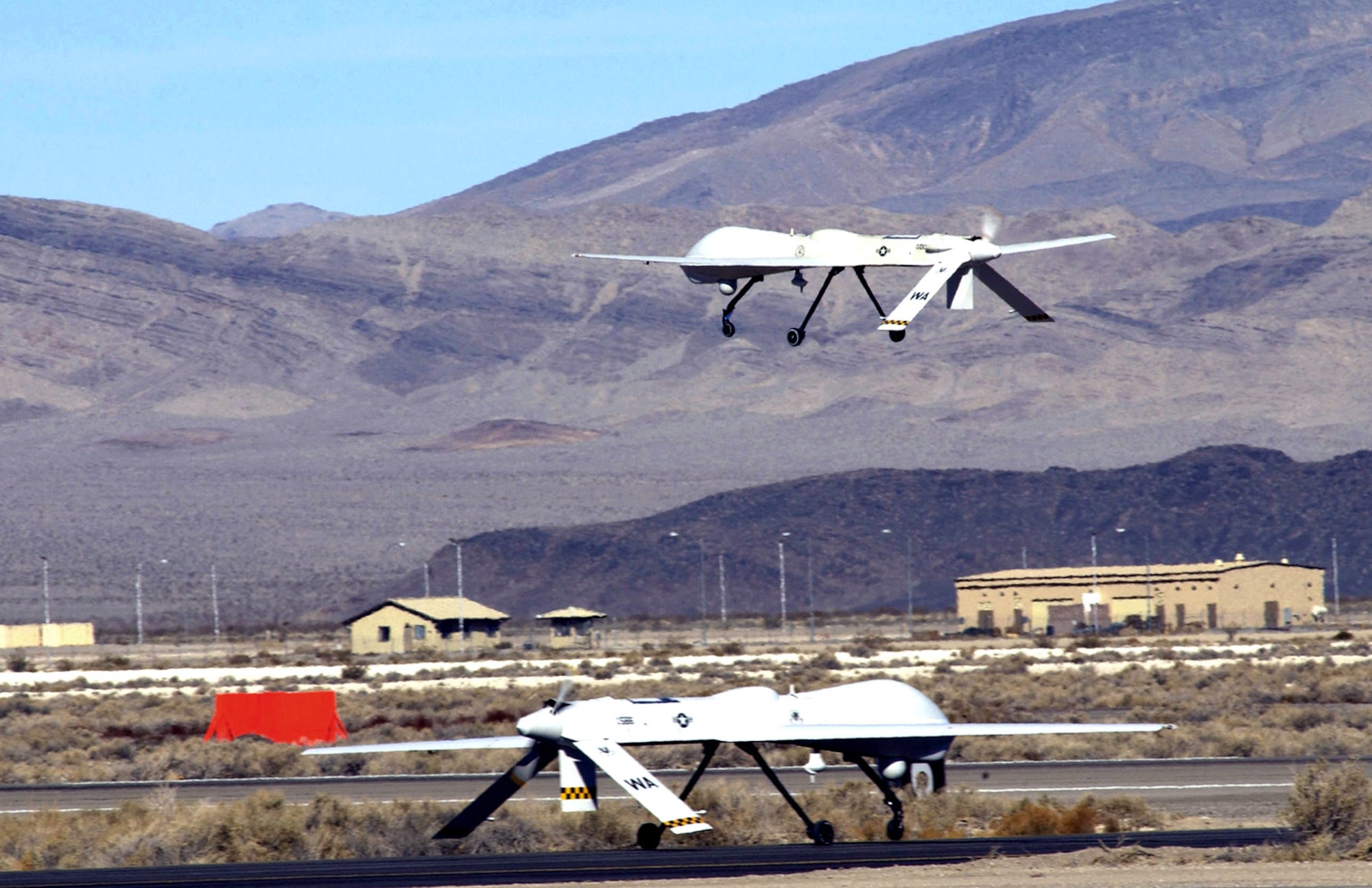 An MQ-1 Predator unmanned aerial vehicle takes off in support of Operation Iraqi Freedom. The Predator provides armed reconnaissance, airborne surveillance and target acquisition for Iraq. (U.S. Air Force photo/Master Sgt. Rob Valenca)